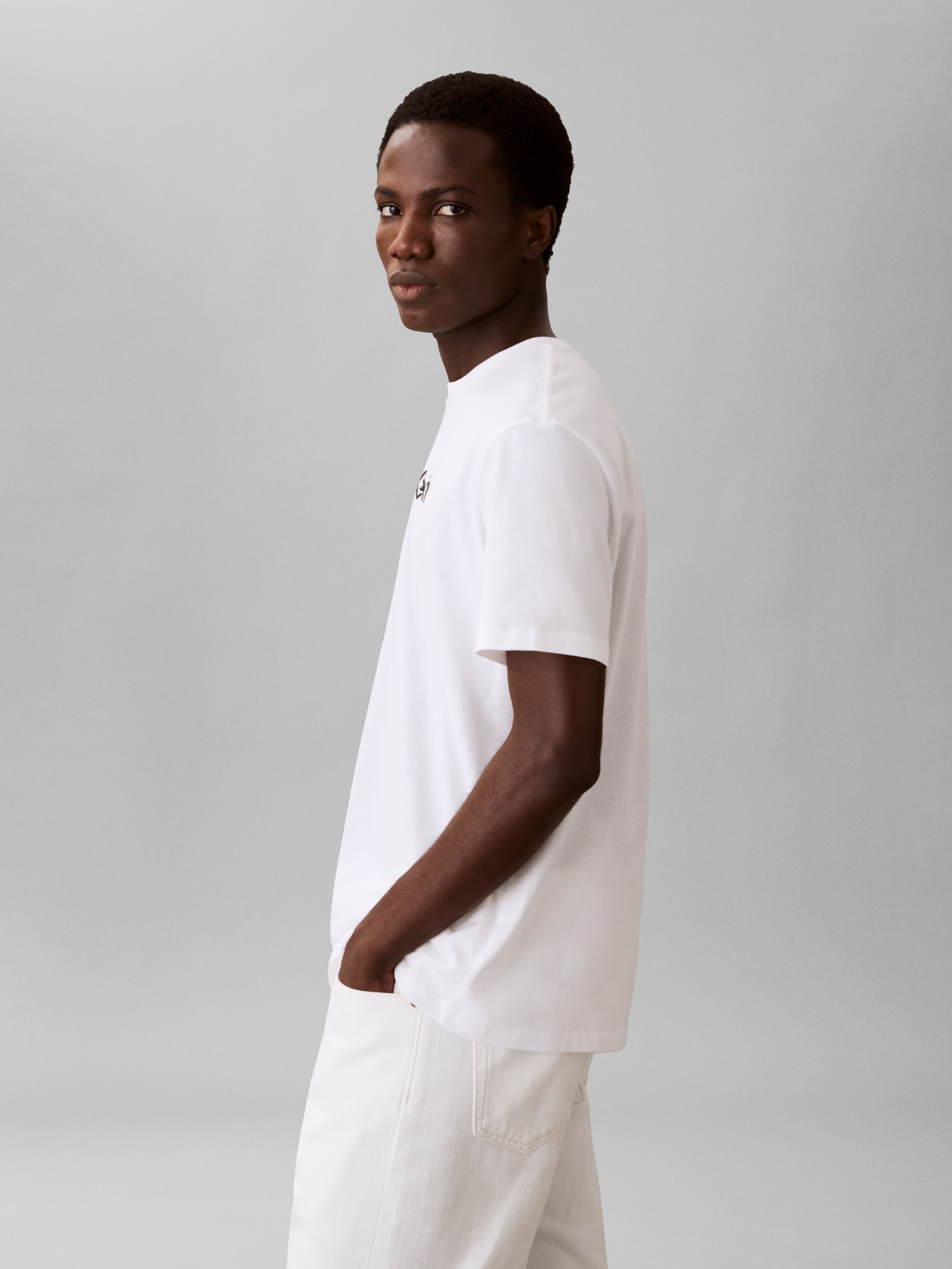 Calvin Klein Jeans T-shirt »30S EU WHOLESALE SPORTSWEAR GRAP« Coupe régulière avec col rond