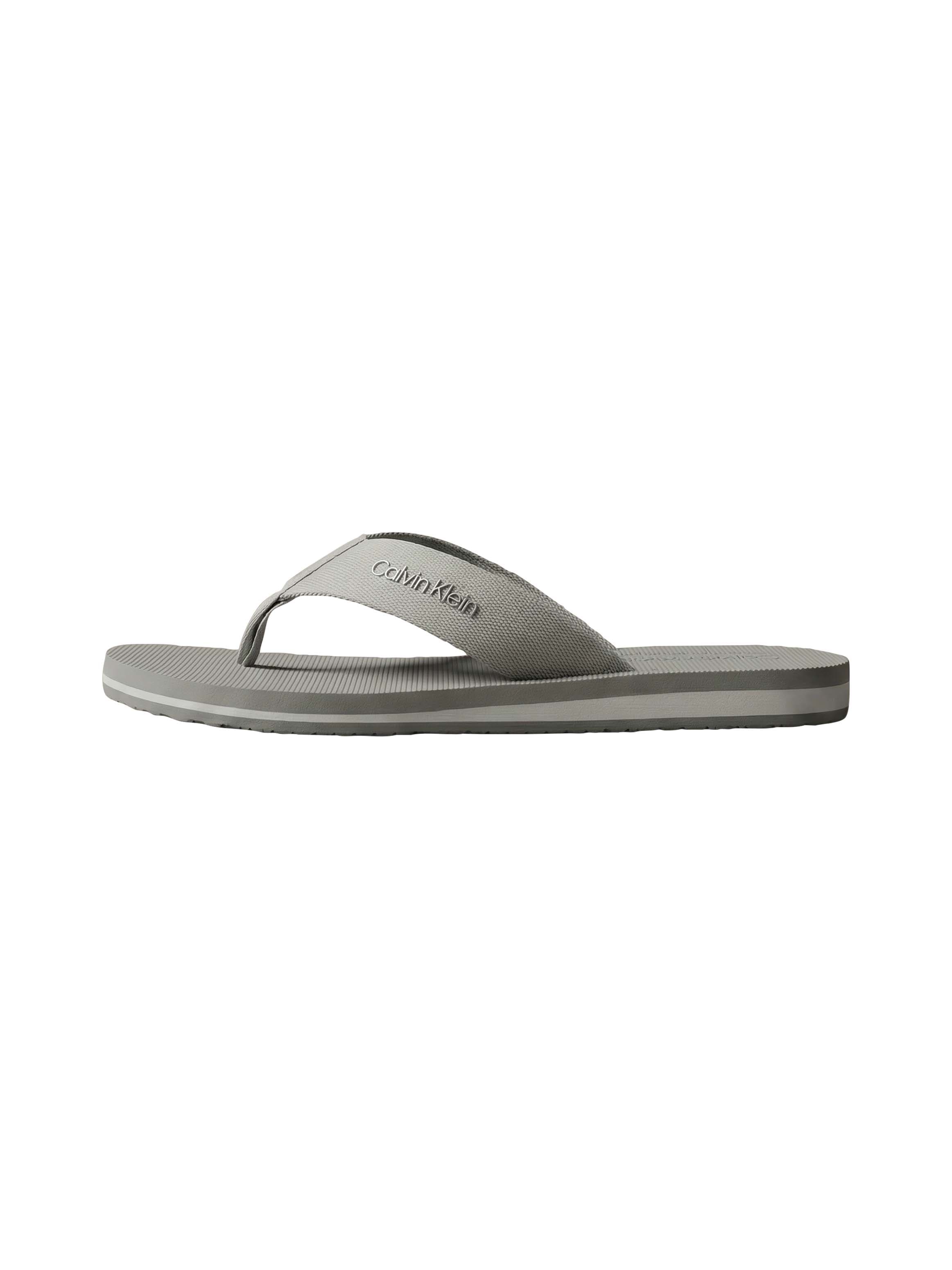 Calvin Klein Séparateur d'orteils »CITY THONG SLIDE«  chaussure de plage, pool slides, chaussure de bain, plate avec logo