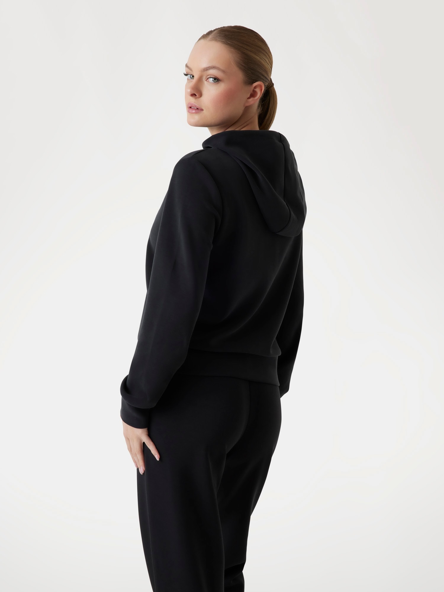 Guess Sweatjacke »OLYMPE FULL ZIP HOODIE« mit Logo-Aufnäher, Regular Fit