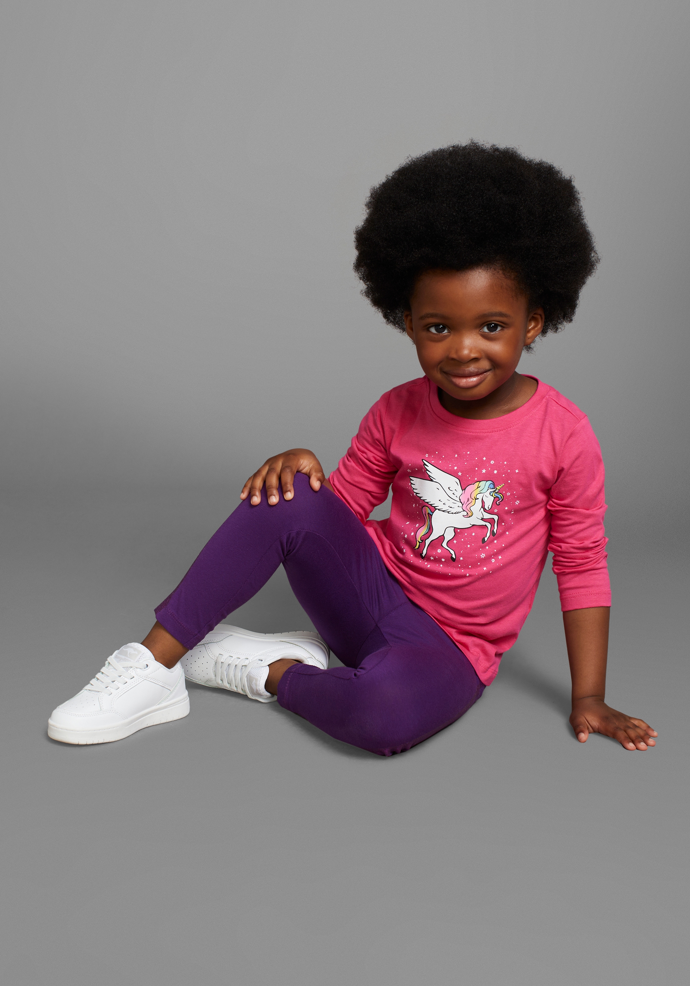 KIDSWORLD Langarmshirt »mit süssem Einhorn Druck«, langärmlig, hüftlange Passform, stylischer Druck