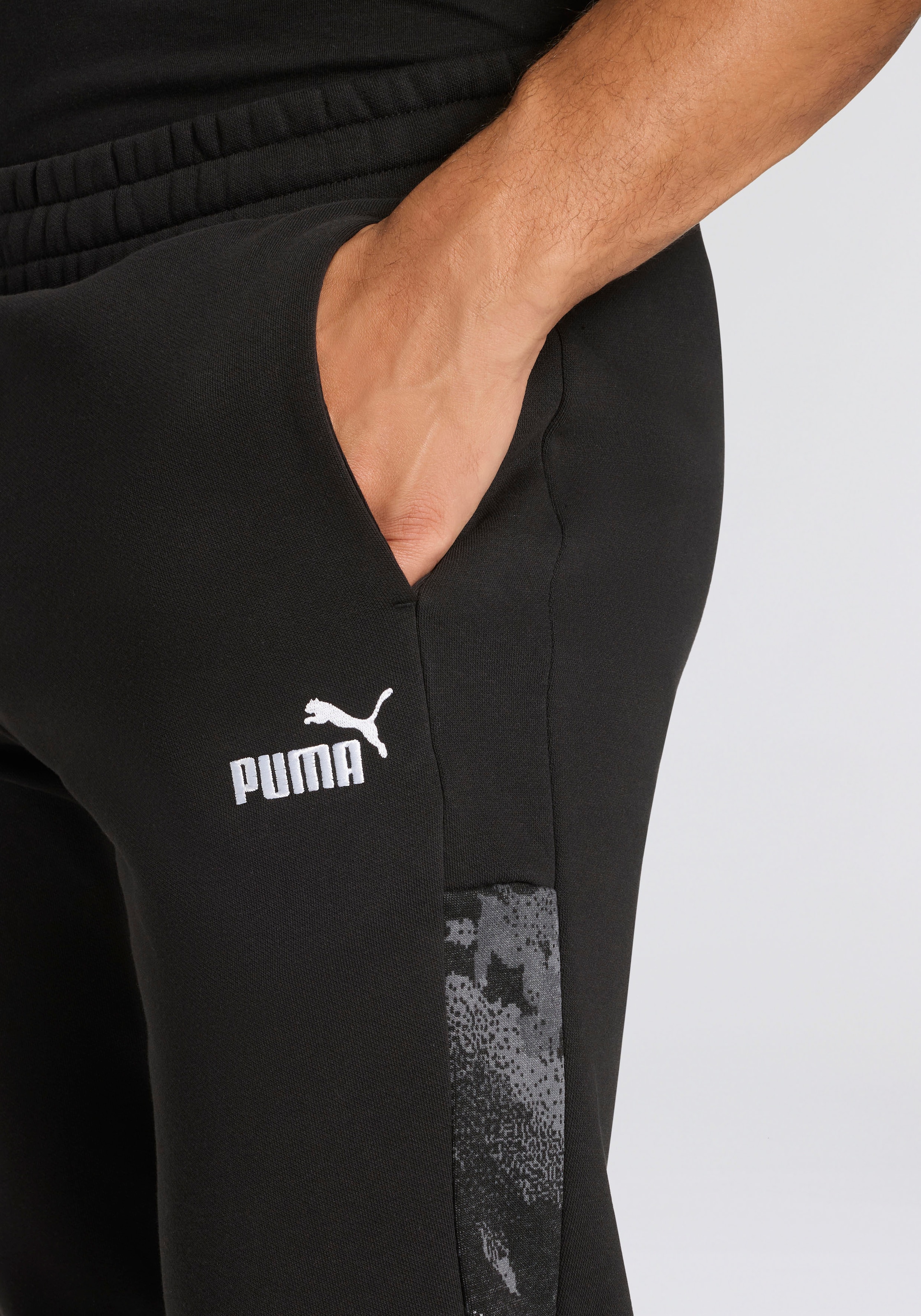 PUMA Trainingshose »ESS CAMO SWEATPANTS FL CL«