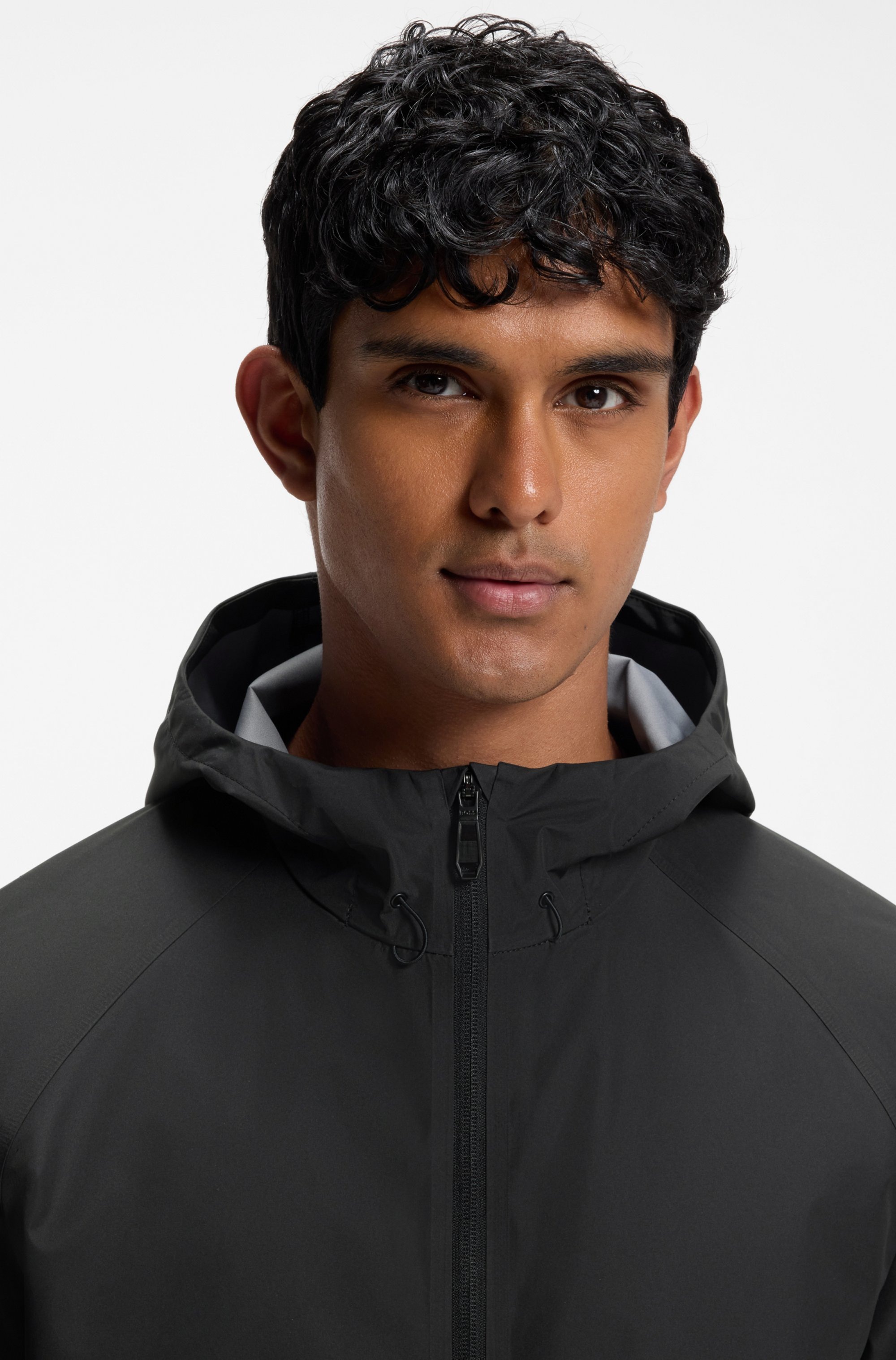 BOSS GREEN Veste de pluie mit Kapuze wasserabweisende Ausrüstung, Regular Fit, Ärmeltasche