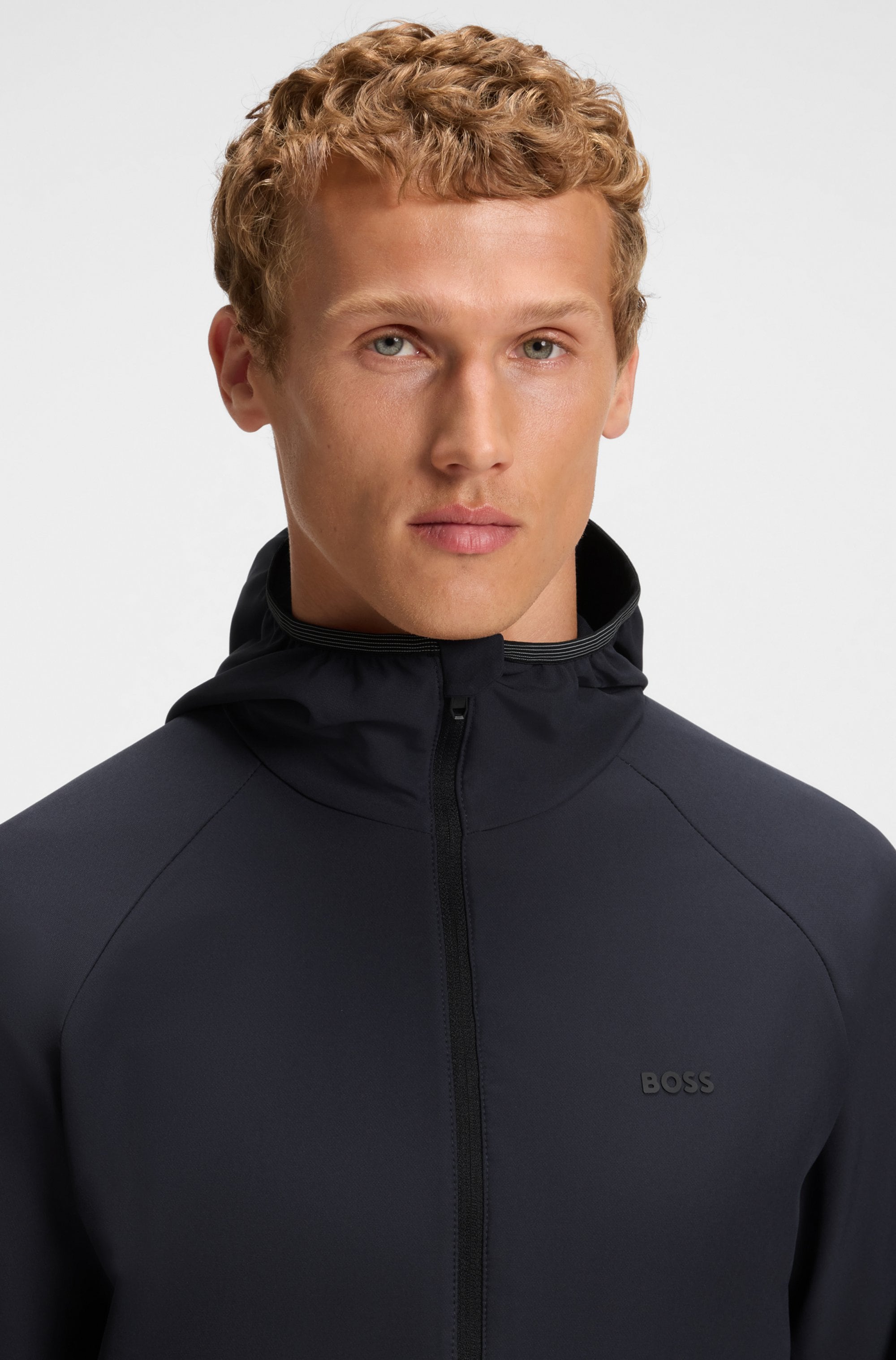 BOSS GREEN Funktionsjacke »L Commuter« mit Kapuze wasserabweisend Funktionsjacke mit gummiertem Label 4 Wege Stretch