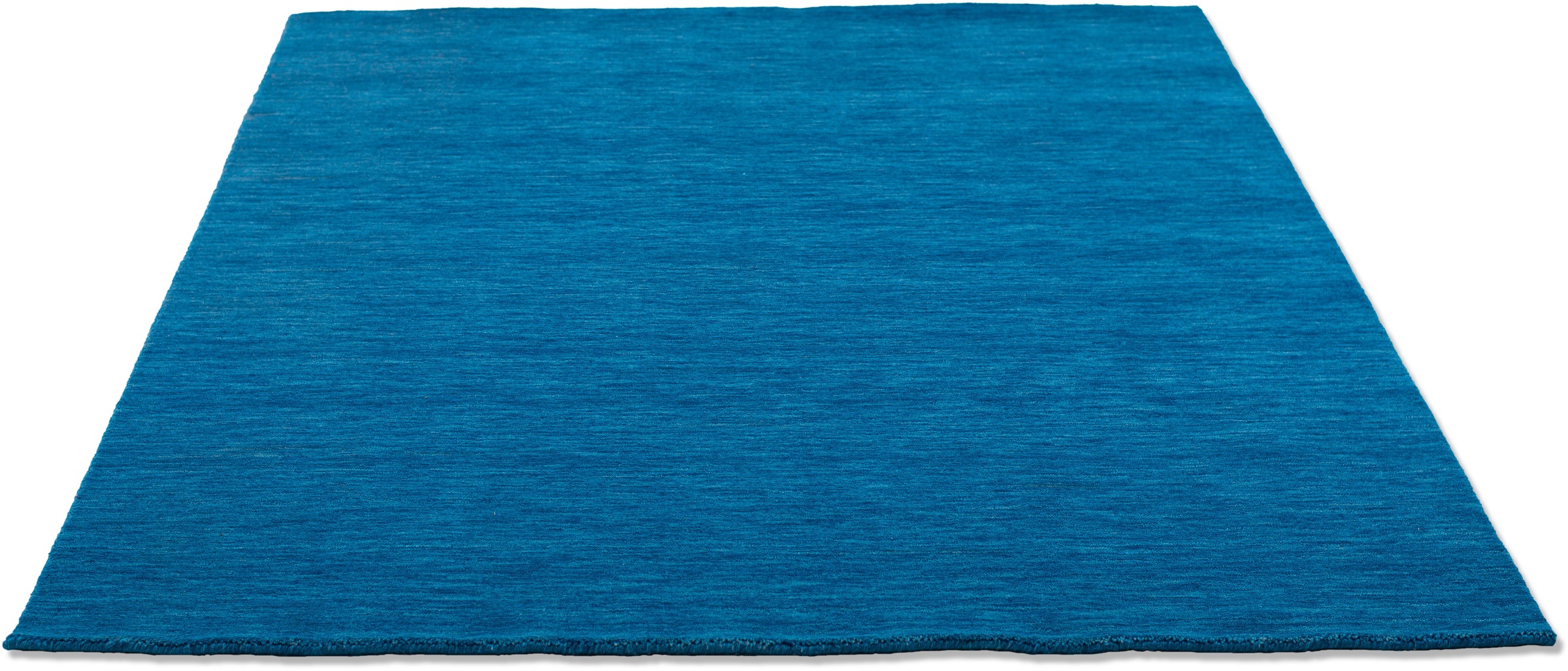 Image of THEKO Wollteppich »Holi«, rechteckig, 13 mm Höhe, Handweb Teppich, Kurzflor, Uni Farben, leicht meliert, reine Wolle, handgewebt mit Knüpfoptik, ideal im Wohnzimmer & Schlafzimmer bei Ackermann Versand Schweiz