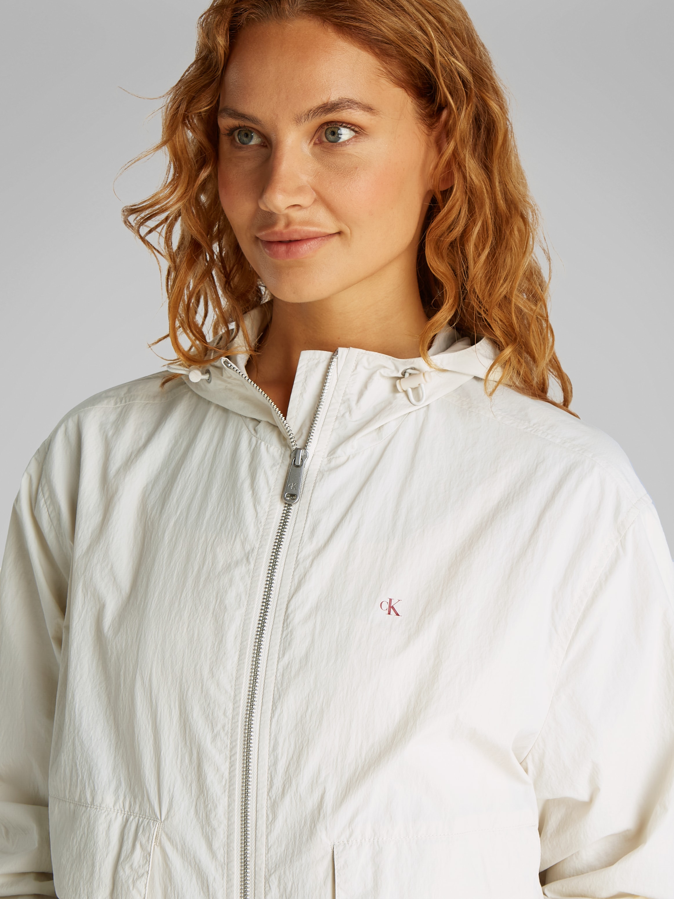 Calvin Klein Jeans Windbreaker »COTTON NYLON WINDBREAKER JACKET«, mit Kapuze, mit Logodruck