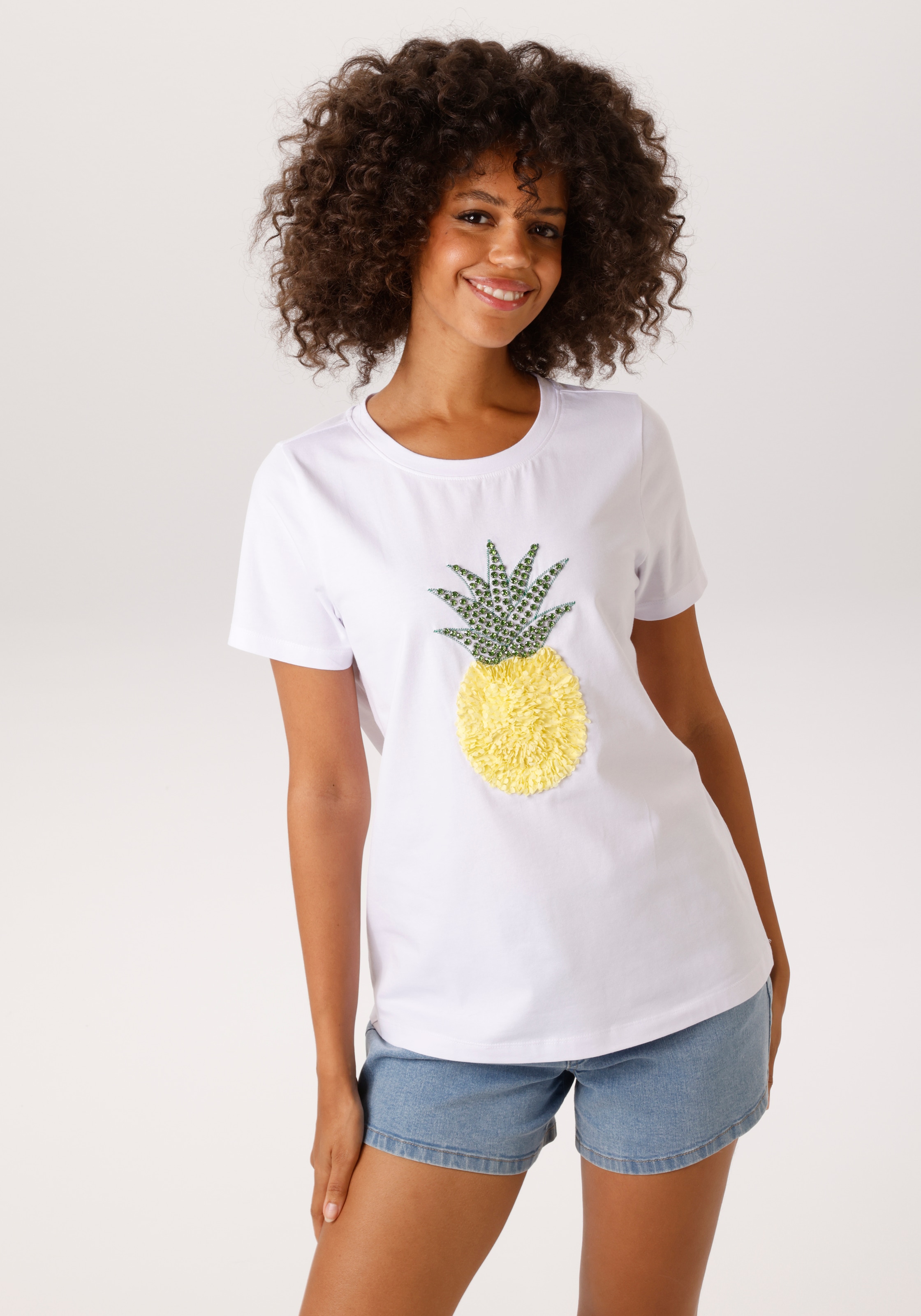 Image of Aniston CASUAL T-Shirt mit Glitzersteinchen verzierter Ananas-Applikation