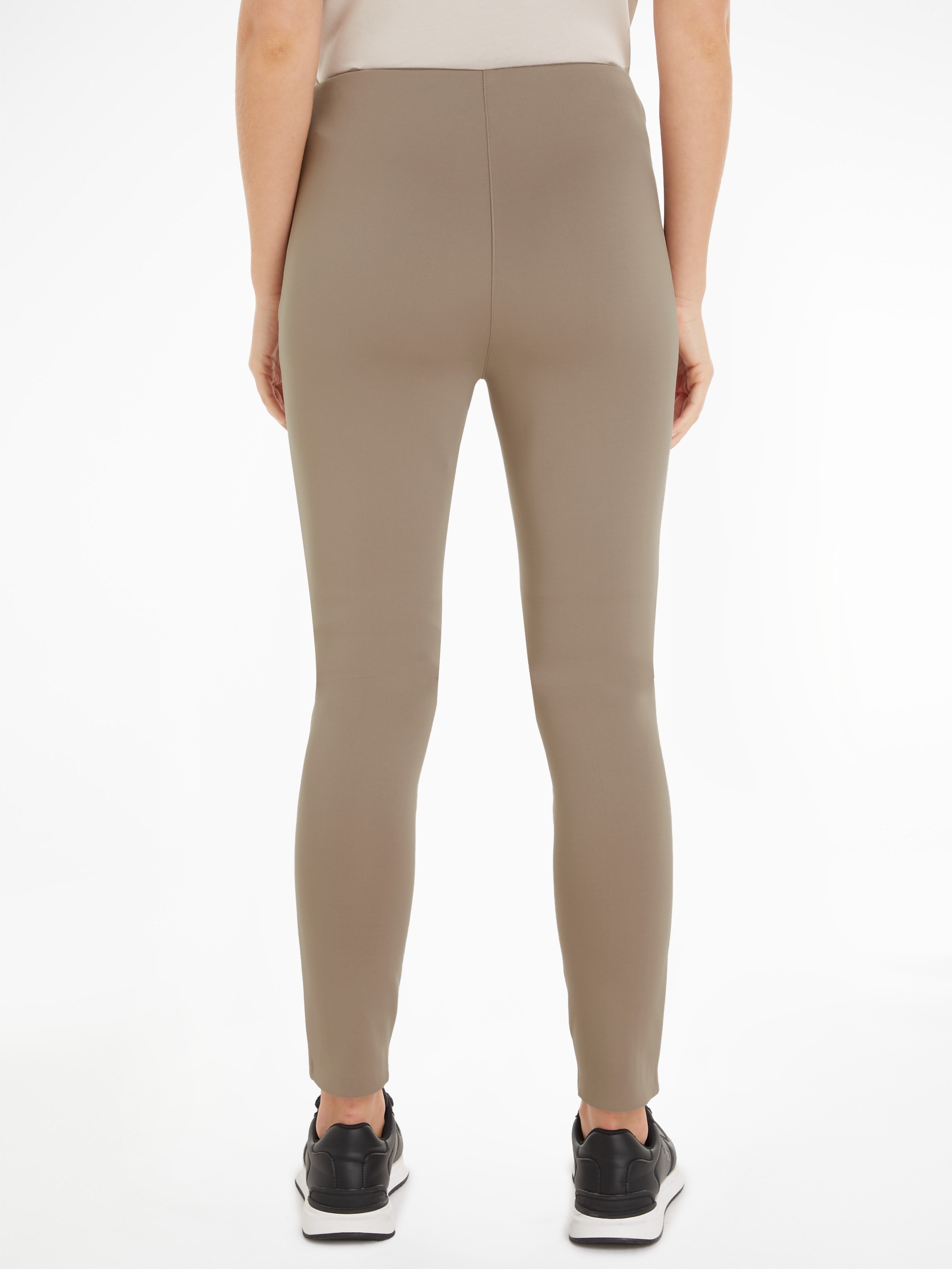 Calvin Klein Leggings »TECHNICAL KNIT LEGGING«, mit Reissverschluss am Beinabschluss