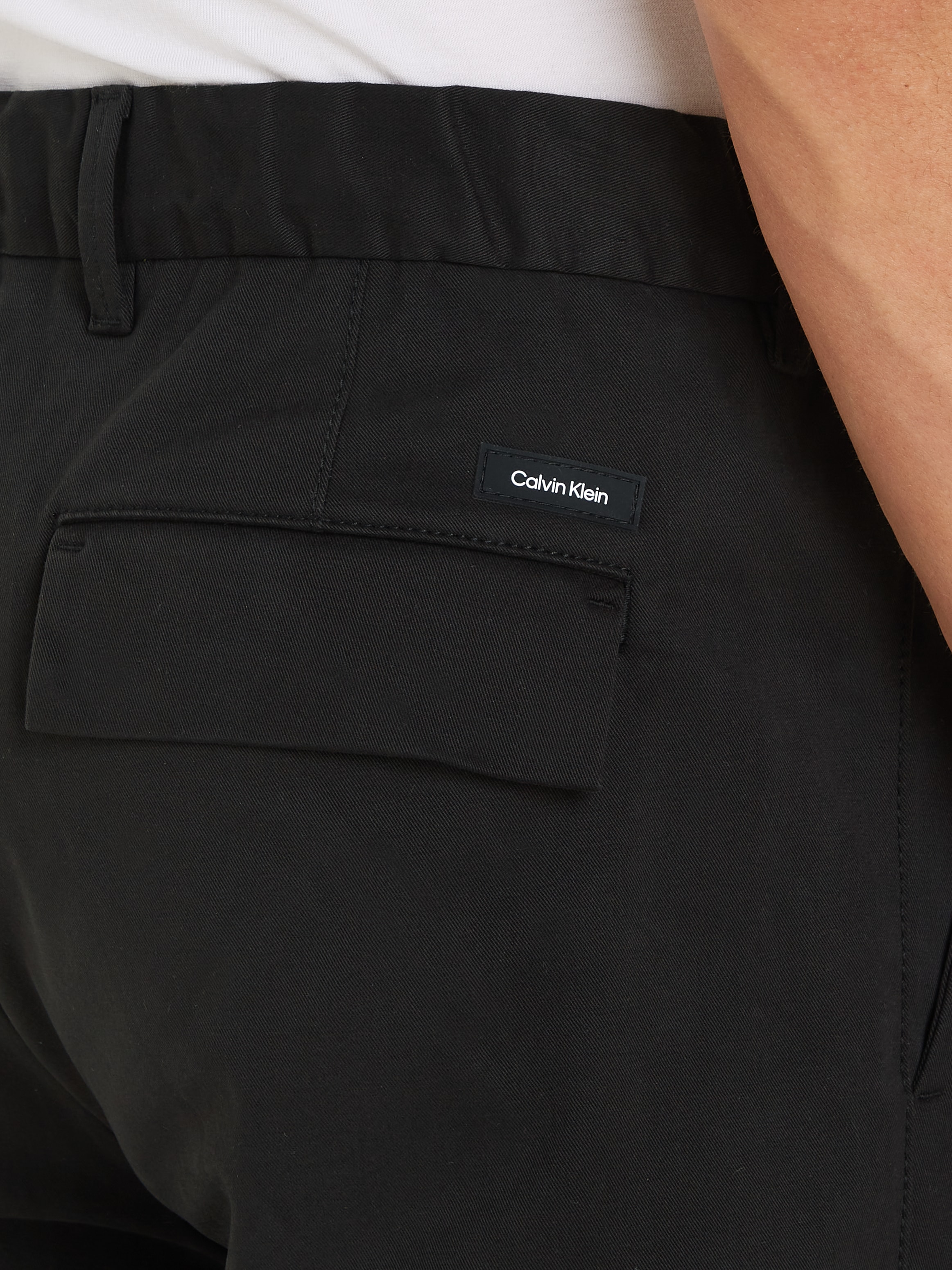 Calvin Klein Bügelfaltenhose »MODERN TWILL TAPERED PLEAT PANTS«, mit Logoprägung