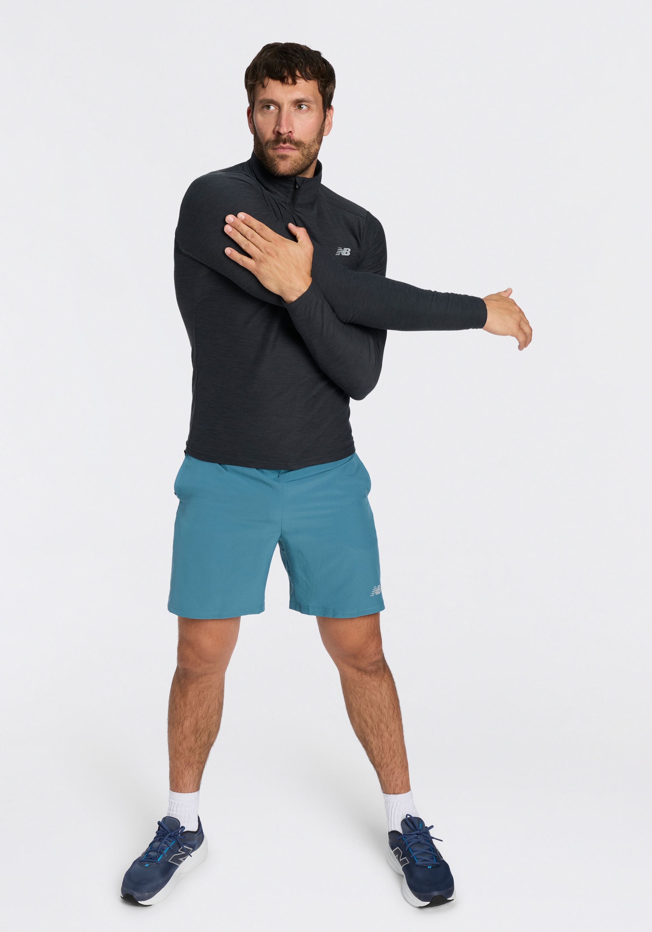New Balance T-shirt de course »Space Dye 1/4 Zip« avec étiquette