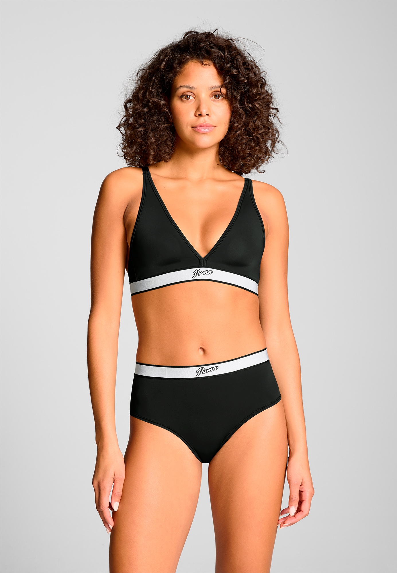 Image of PUMA Sport-BH mit tiefem V-Ausschnitt
