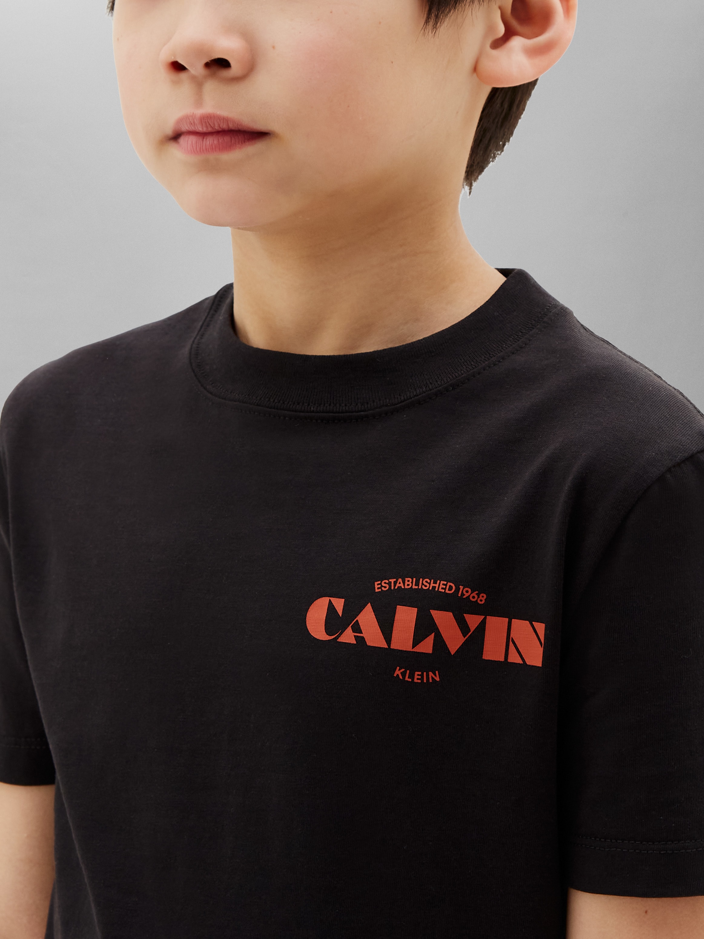 Calvin Klein Jeans T-Shirt »CALVIN SMALL CHEST PRINT TEE« Regular fit mit Rundhalsausschnitt