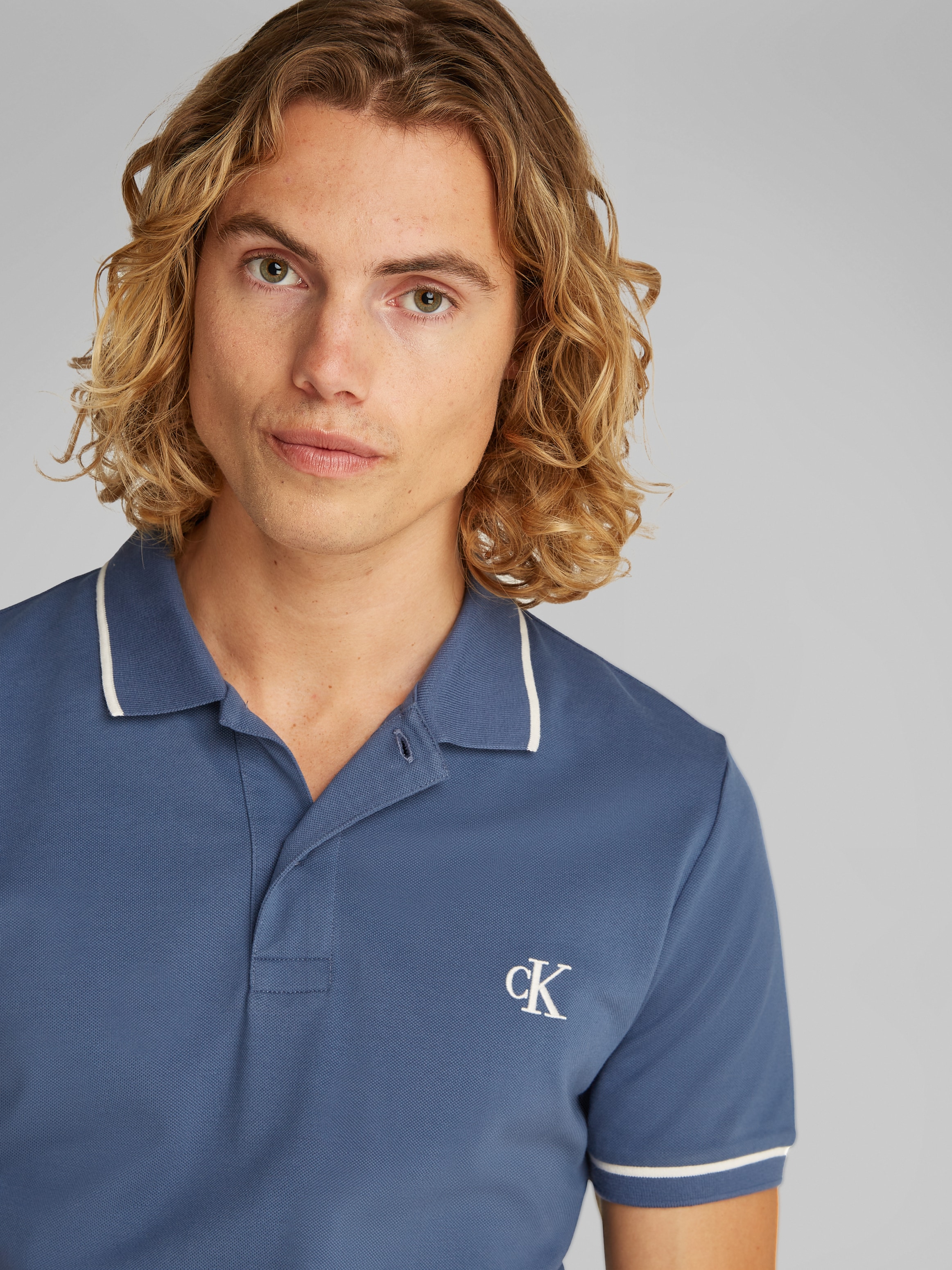 Calvin Klein Jeans Poloshirt »TIPPING SLIM POLO«, mit Streifendetail am Kragen