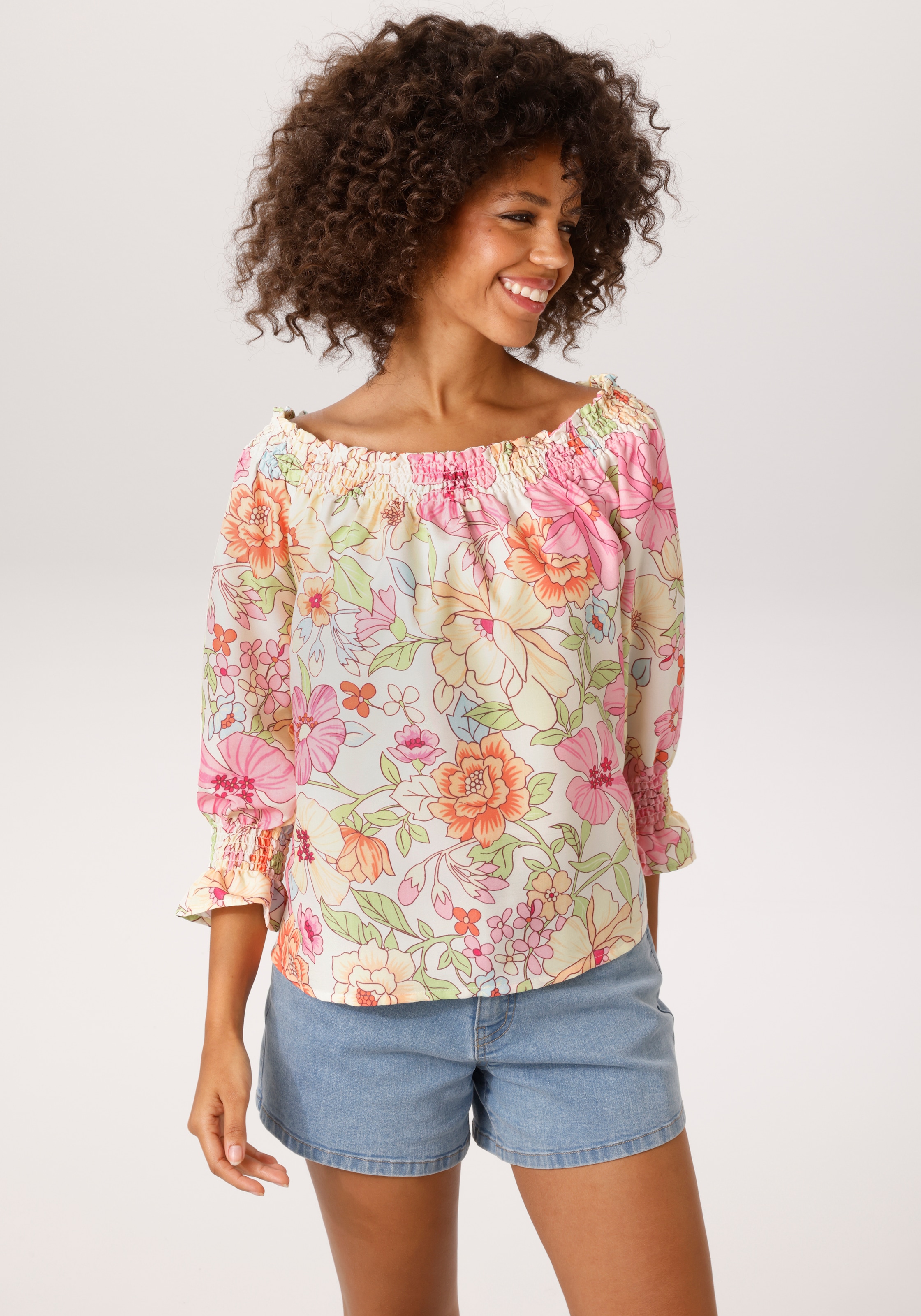Image of Aniston CASUAL Schlupfbluse mit grossflächigem, pastellfarbenen Blumendruck