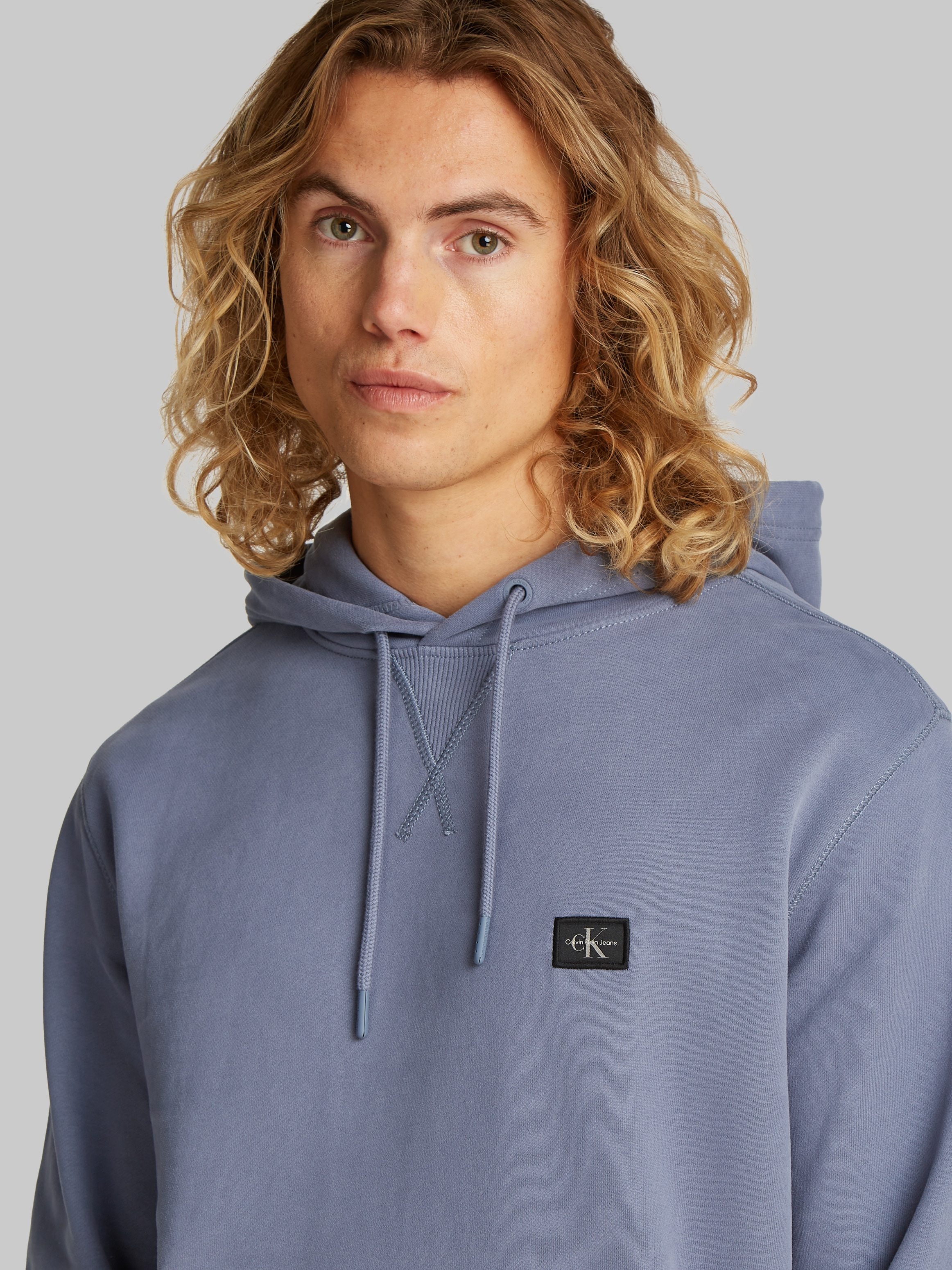 Calvin Klein Jeans Sweatshirt »WOVEN LABEL HOODIE«, Kängurutasche, Logostickerei