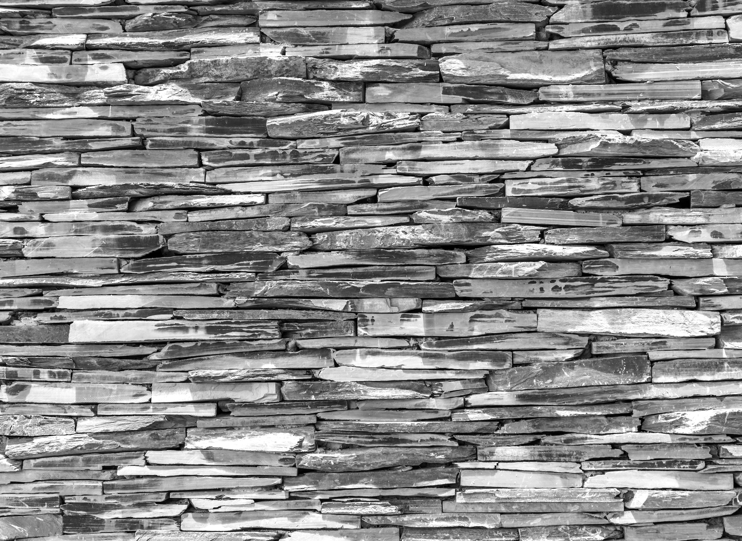 Image of Papermoon Fototapete "Steinwand Schwarz & Weiss"