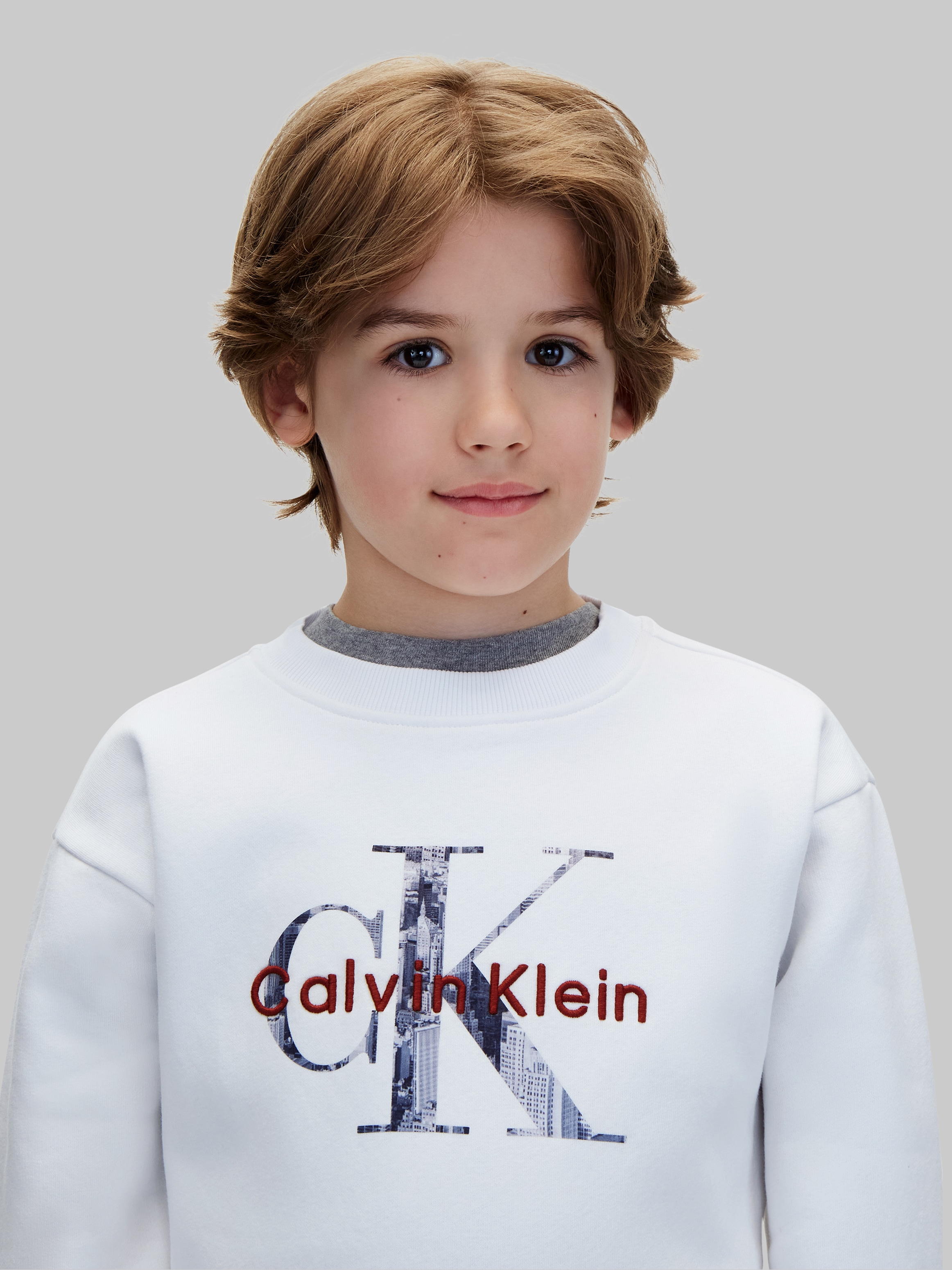 Calvin Klein Jeans Sweatshirt »FILLED MONOLOGO CN SWEATSHIRT«, Regular fit mit Rundhalsausschnitt, Logoschriftzug
