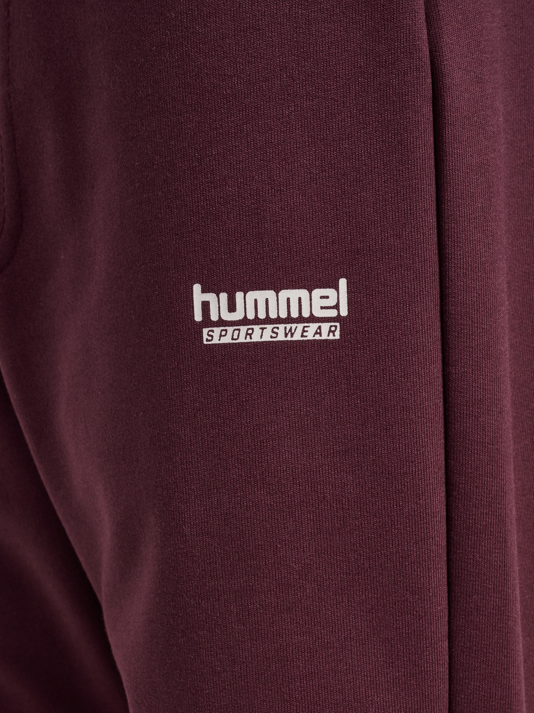 hummel Jogginghose »hmlJR REGULAR ADJ WAIST PANTS«  mit Seitentaschen mit Reissverschlüssen, aus weichem Sweatstoff