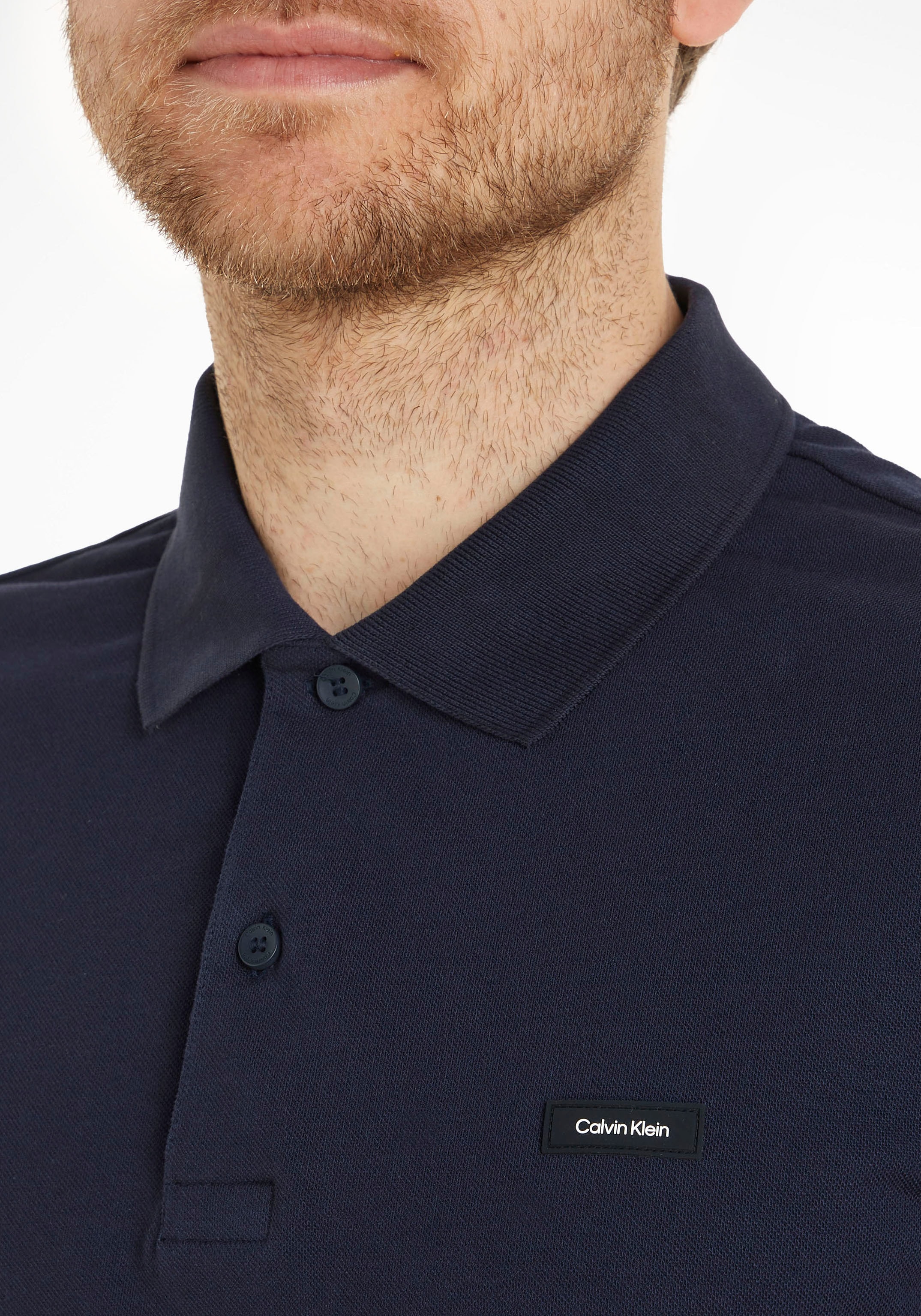 Calvin Klein Poloshirt, mit Calvin Klein Logo auf der Brust