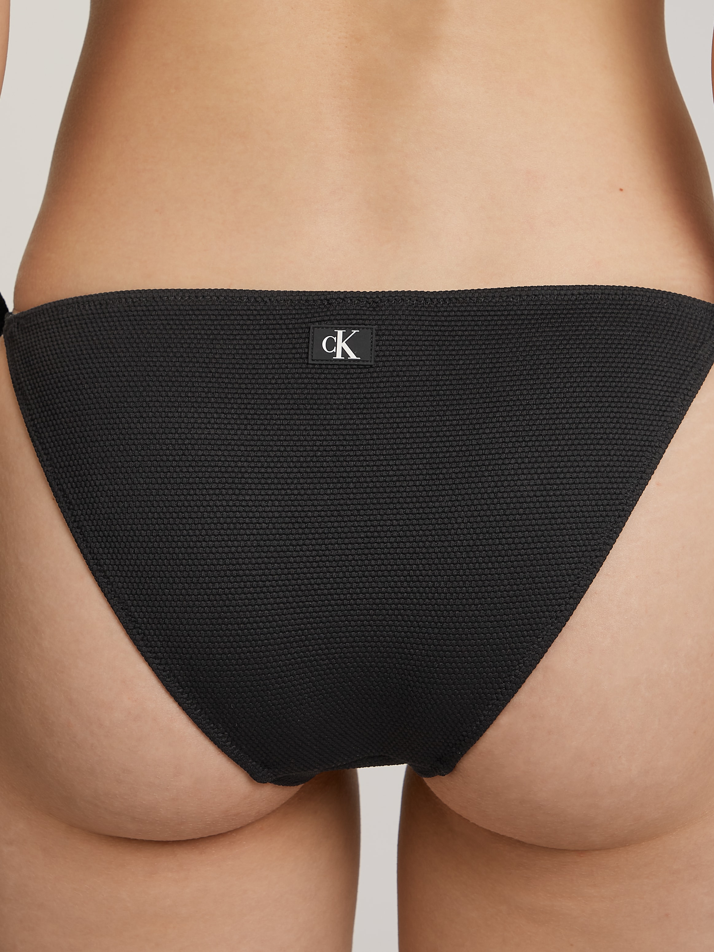 Calvin Klein Swimwear Bikini-Hose »STRING SIDE TIE BIKINI«, mit Logodruck
