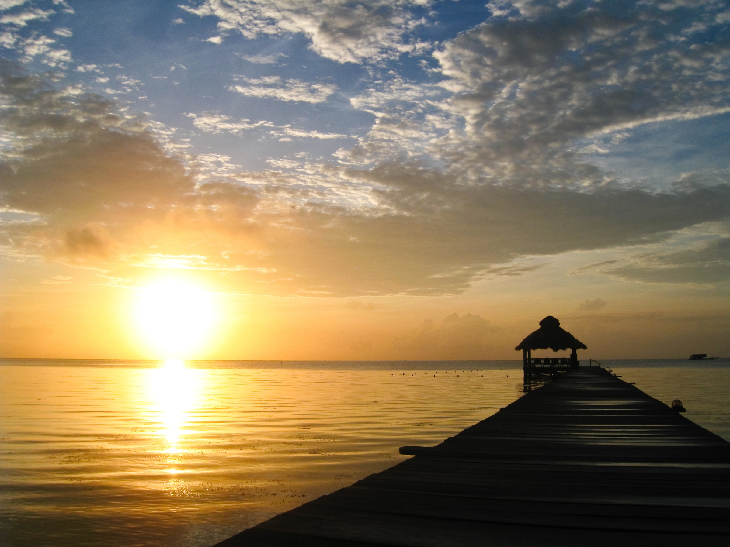 Image of Papermoon Fototapete »Sunburst over Belize« bei Ackermann Versand Schweiz