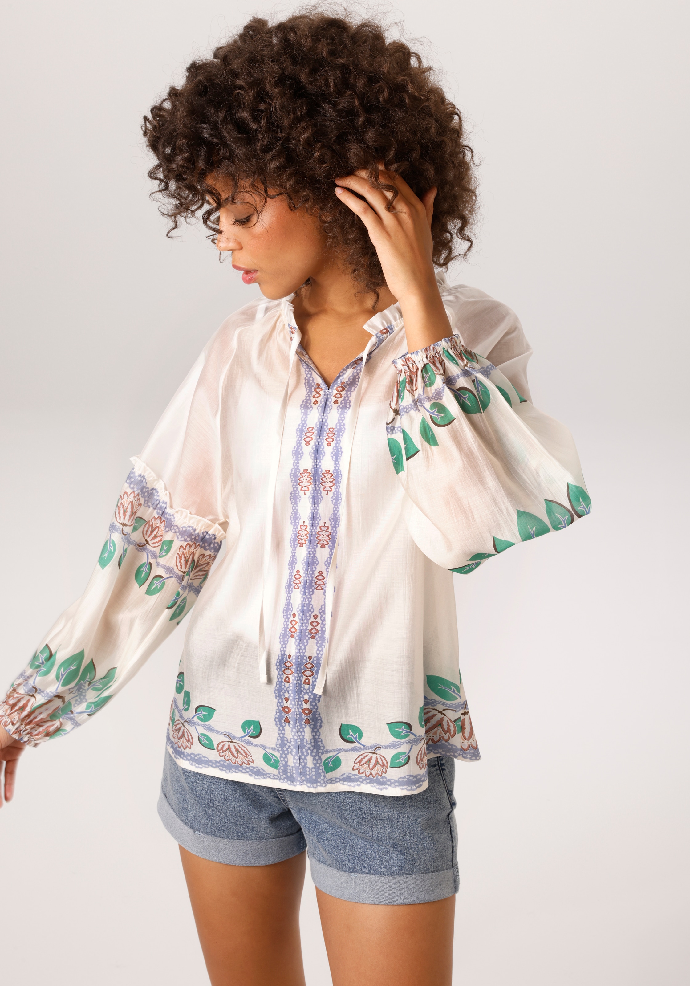 Image of Aniston CASUAL Schlupfbluse mit Bordüren und grossem Mandala-Druck im Rücken