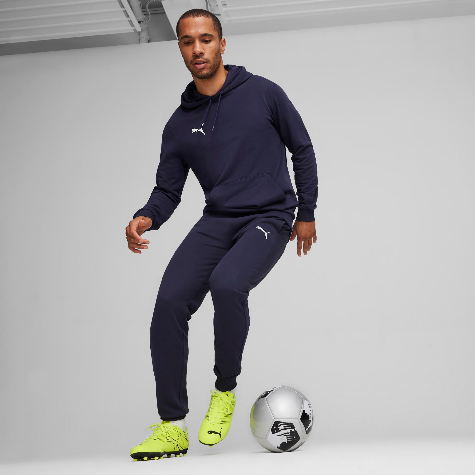 PUMA Pantalon de survêtement »TEAMGOAL CASUALS PANTS«  coupe slim fit, pour football et activités sportives