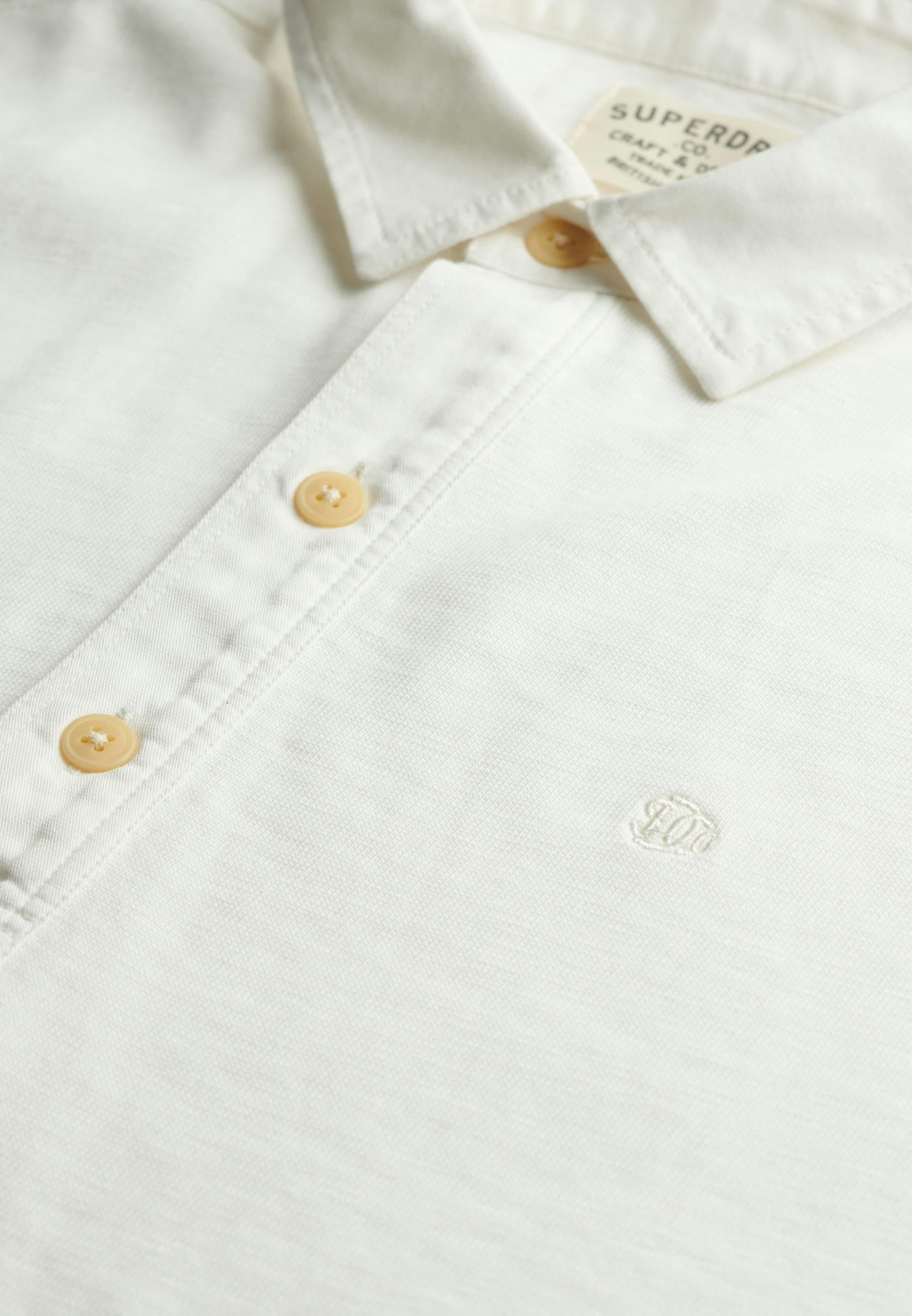 Superdry Polo à manches longues »CLASSIC RUGBY TOP« en coton et jersey simple, coupe décontractée, avec patte de boutonnage courte