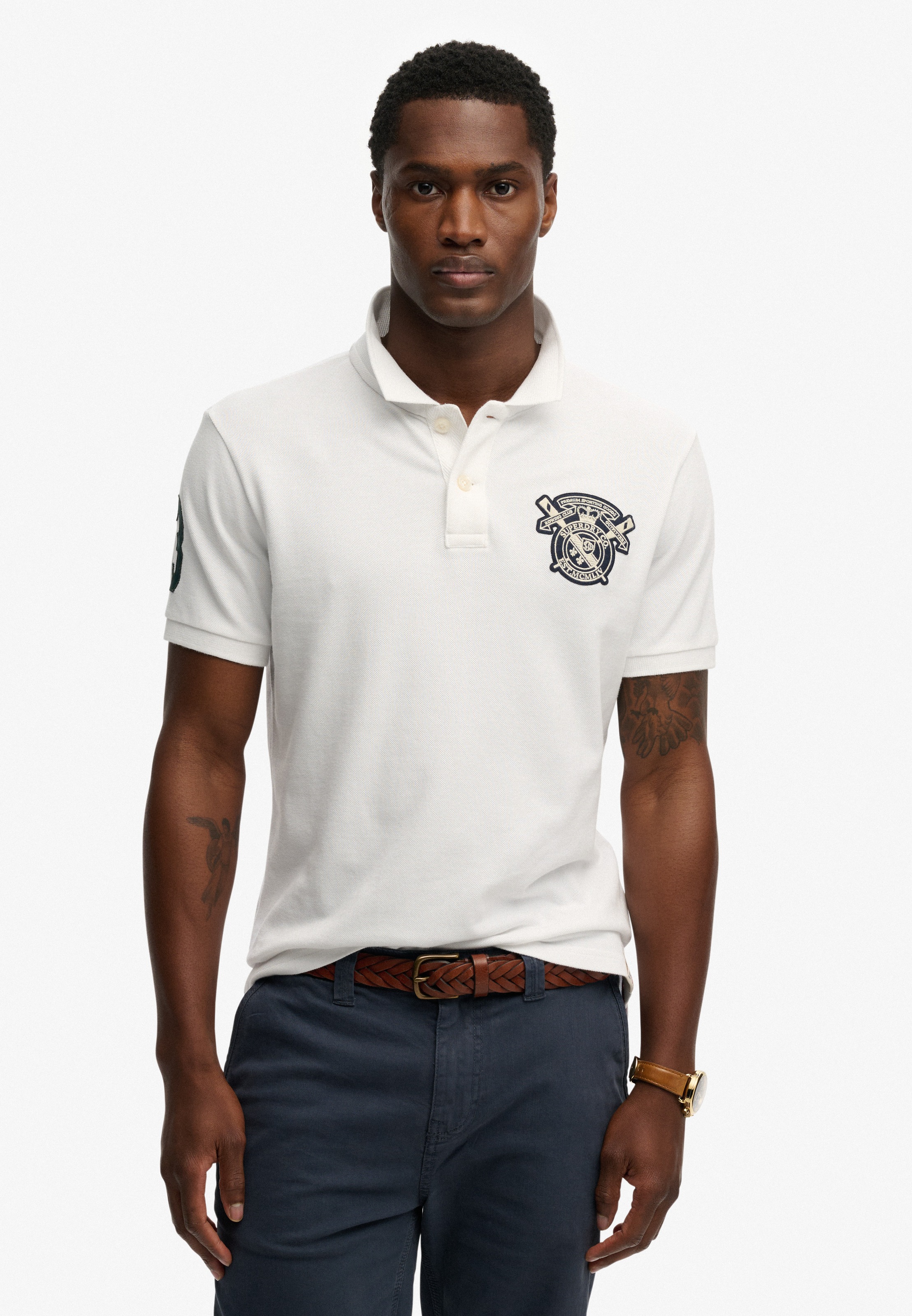 Image of Superdry Poloshirt "CREST POLO" mit Markenlabel, aus Baumwolle, Relaxed Fit, bedruckte Optik