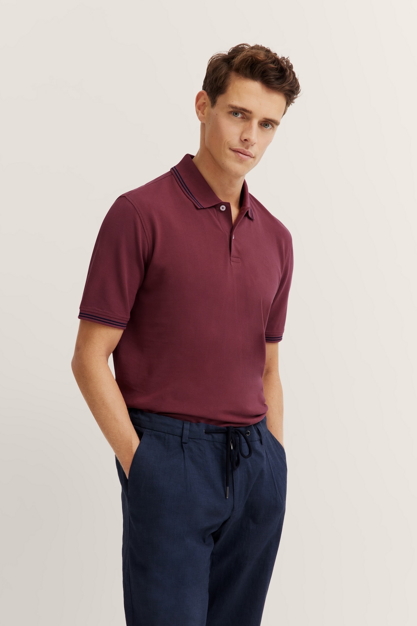 Image of bugatti Poloshirt mit Kontraststreifen und Bruststickerei