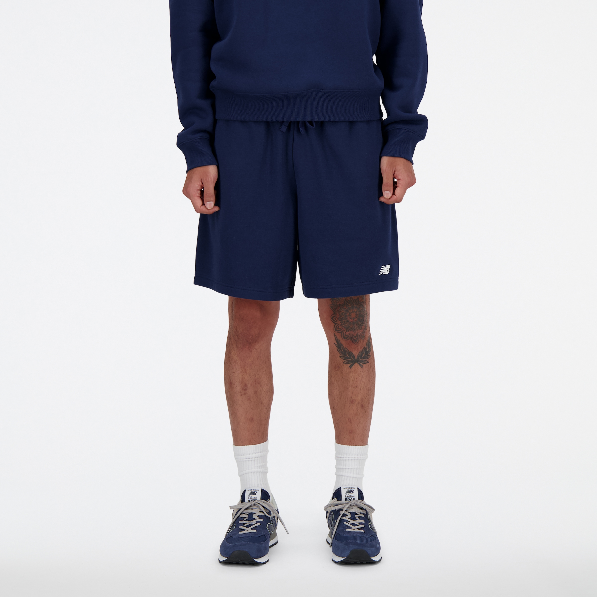 Image of New Balance Sweatshorts "Sport Essentials French Terry Short 7"" mit Eingrifftaschen und Gesässtasche, lockere Passform