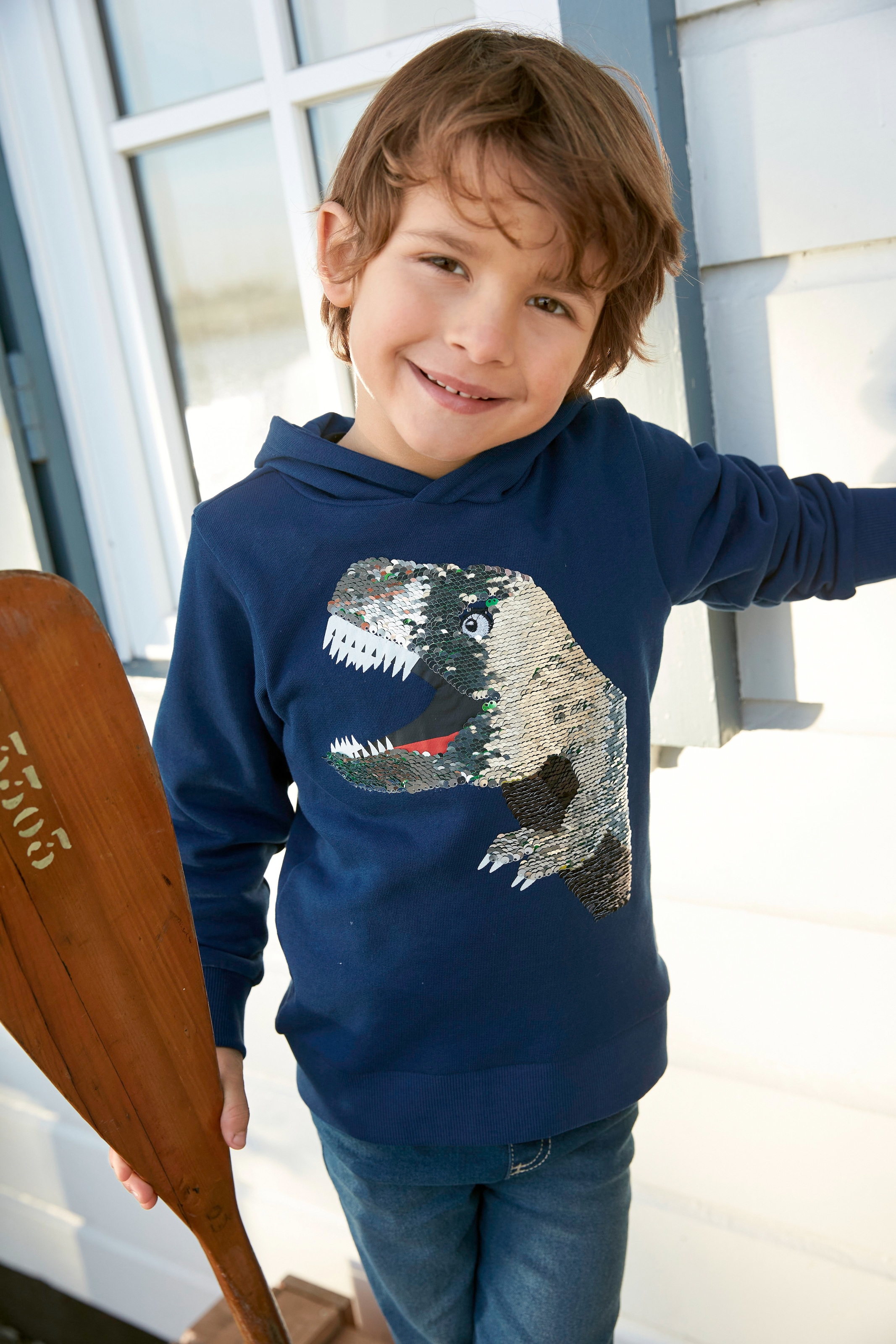 KIDSWORLD Kapuzensweatshirt »mit aus versandkostenfrei Wendepailletten« tollem auf Dino