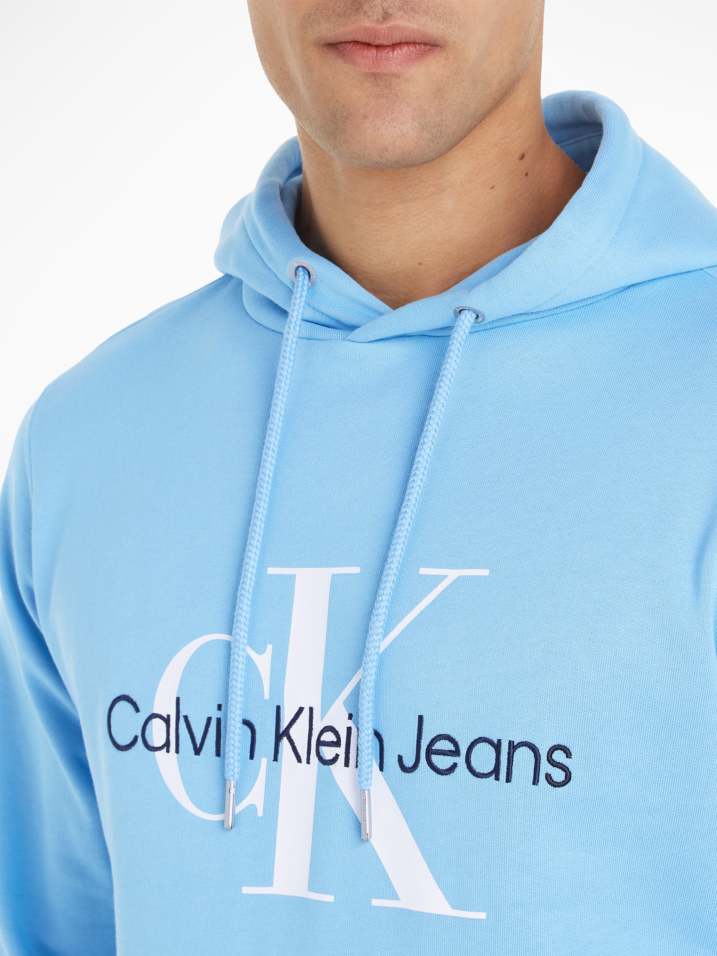 Calvin Klein Jeans Kapuzensweatshirt »SEASONAL MONOLOGO REGULAR HOODIE«, mit Logodruck und Stickerei
