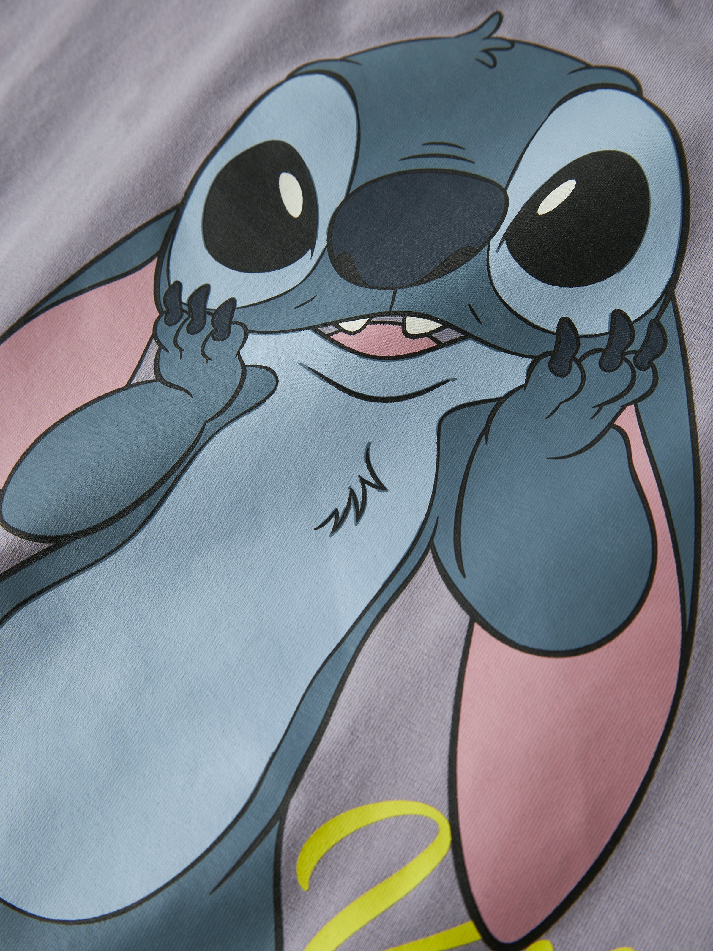 Name It T-shirt »NKFDYMI STITCH SS NREG TOP BOX NOOS WDI« avec superbe impression pailletée