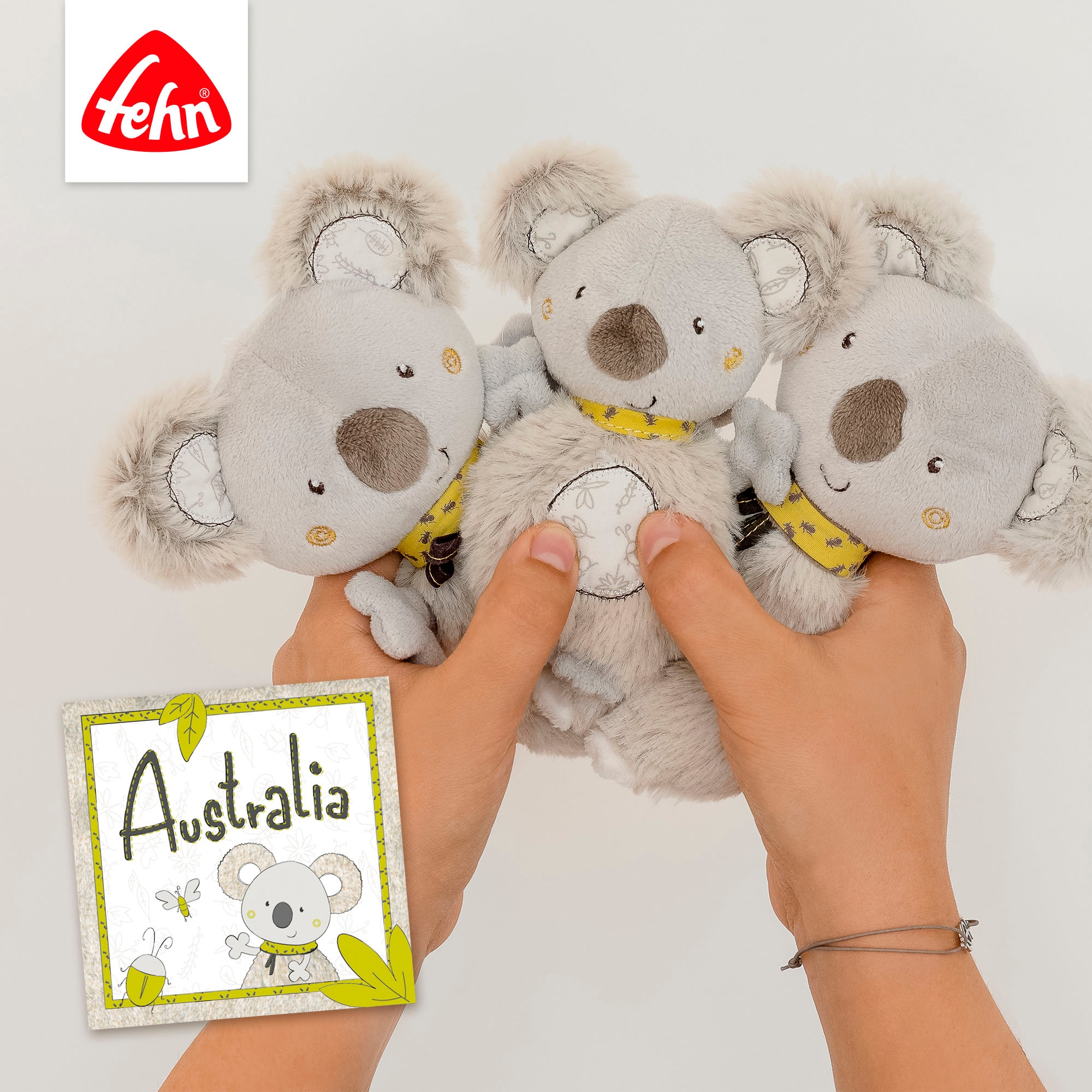 Fehn Greifspielzeug »Australia, Stoffbuch«, mit Ring zur Befestigung an Kinderwagen, Babyschale oder Bett