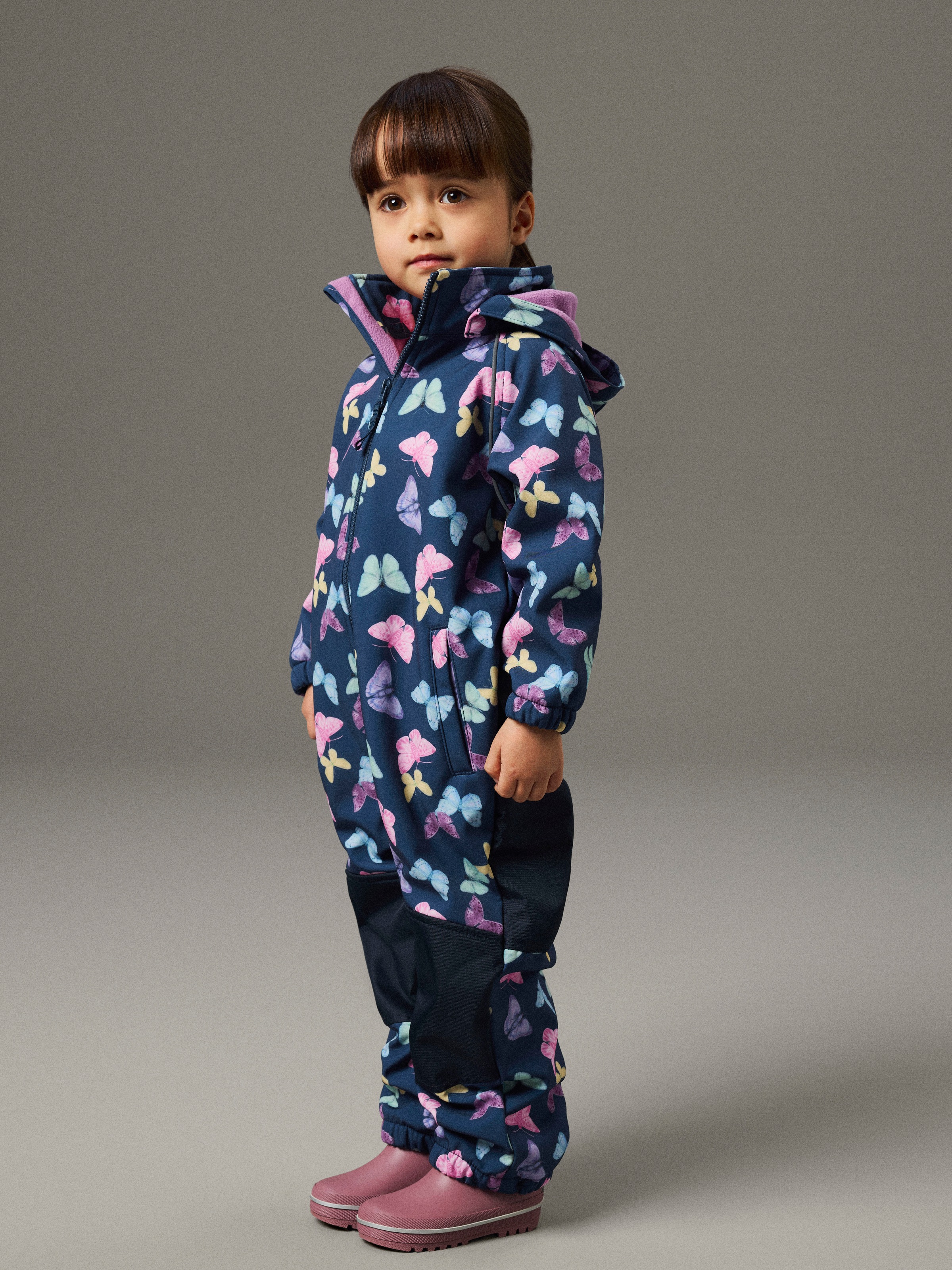 Image of Name It Softshelloverall "NMFALFA08 SOFTSHELL SUIT AOP 1FO NOOS" mit verstellbarer und abnehmbarer Fussschlaufe