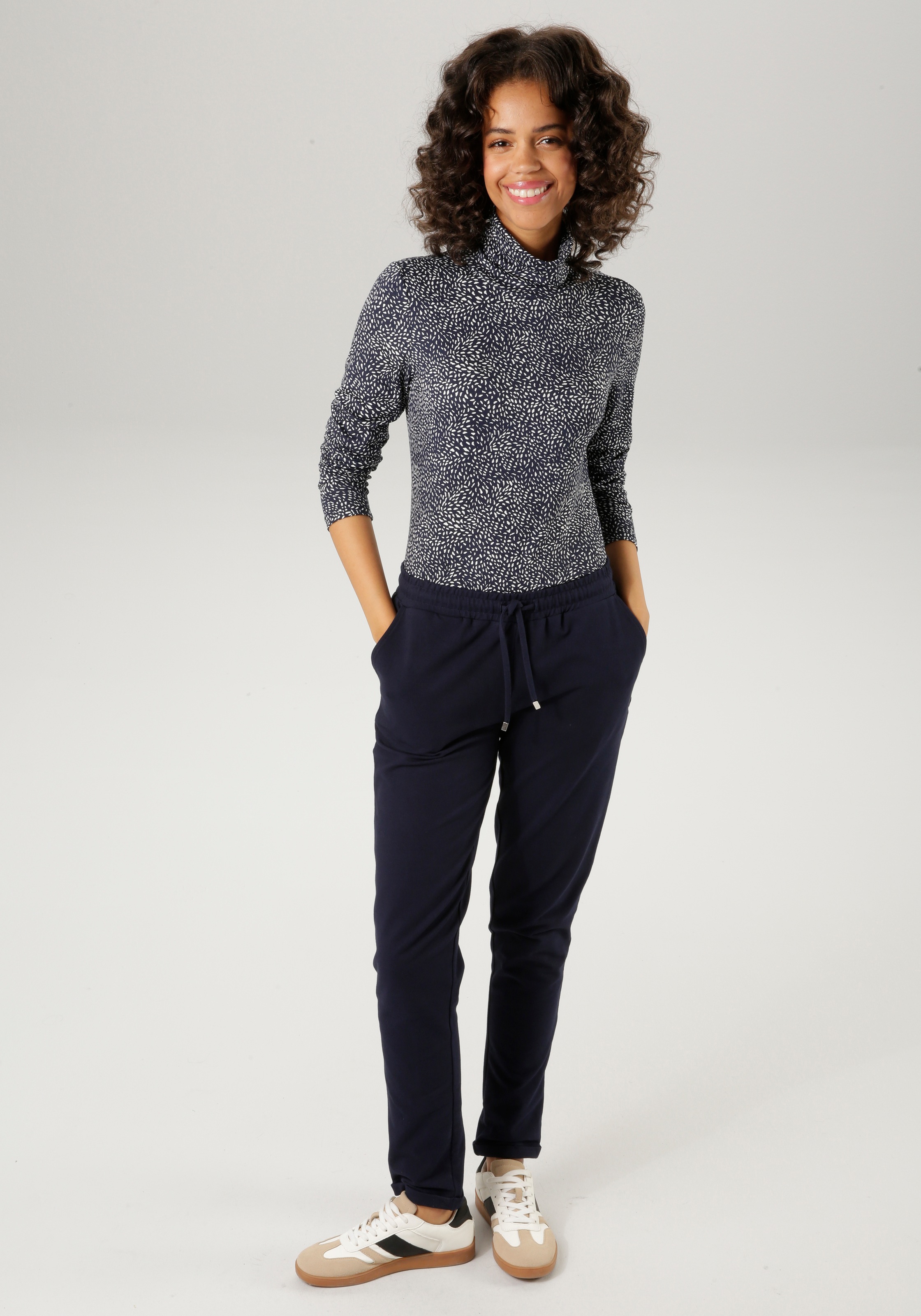Aniston CASUAL Rollkragenshirt, mit Animal-Print oder graphischem Druck