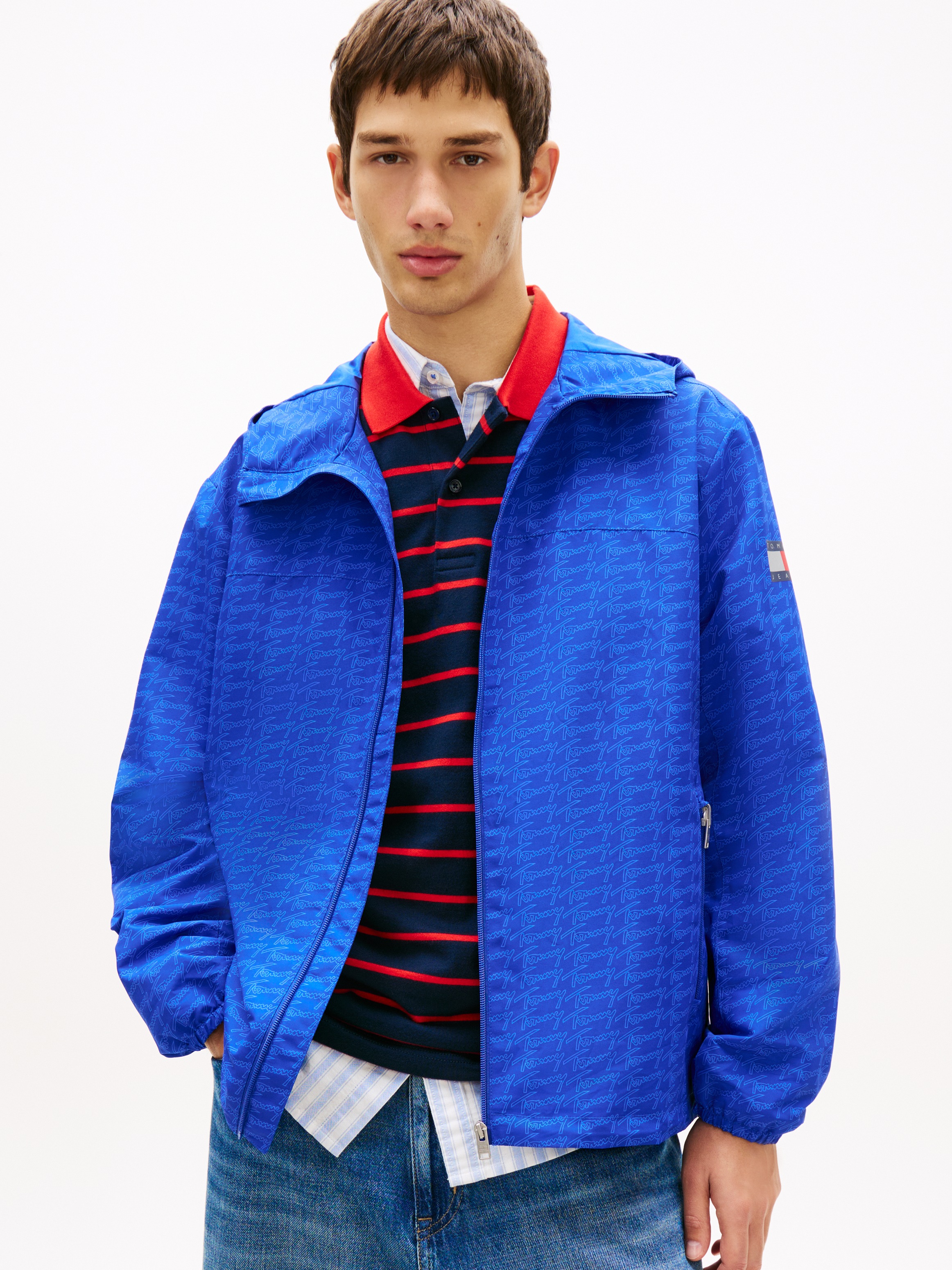 Image of Tommy Jeans Windbreaker "TJM AOP PACKABLE" mit Kapuze wasserabweisend, winddicht, verstaubar
