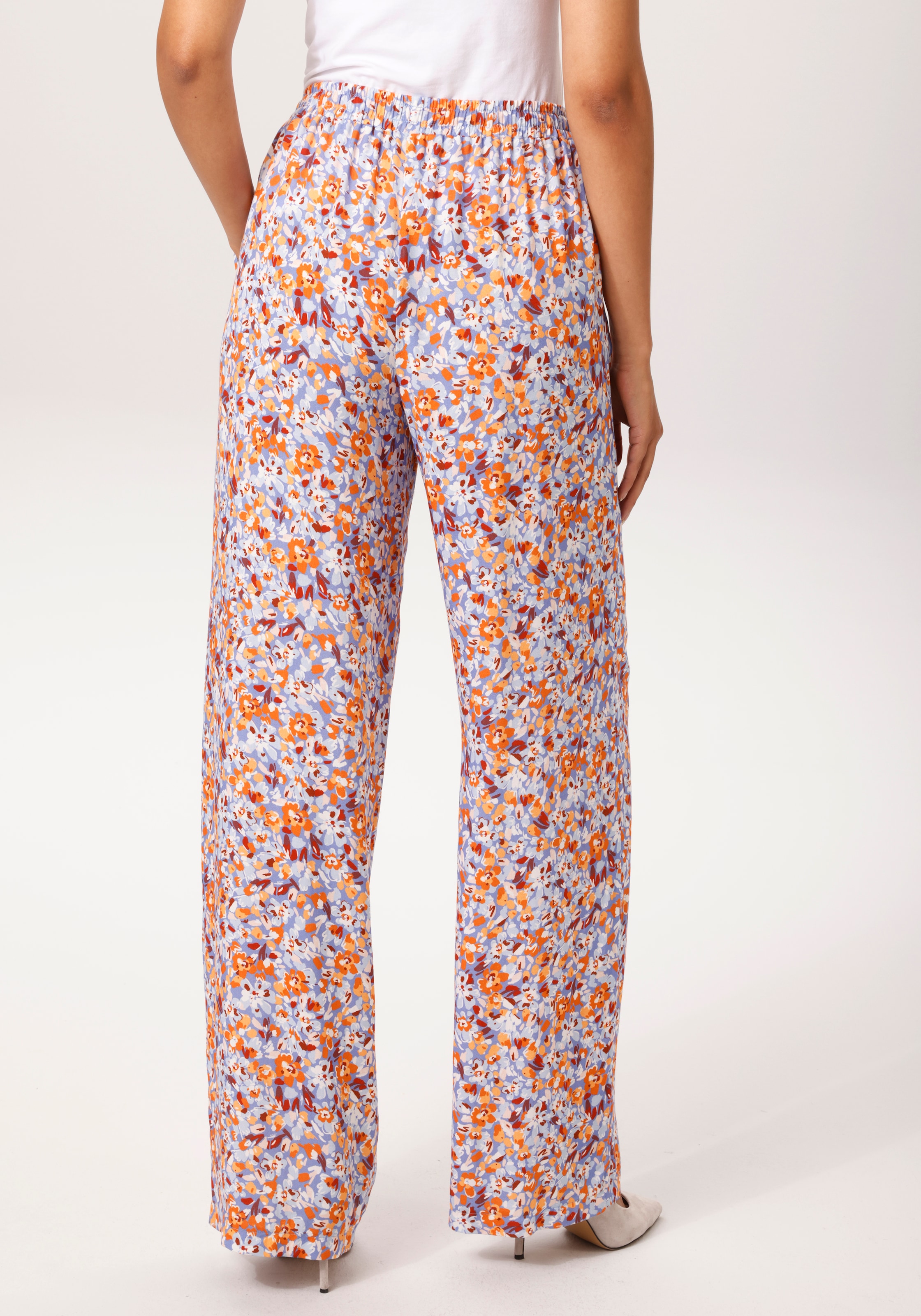 Image of Aniston CASUAL Schlupfhose mit farbharmonischen, grafischen Blumen bedruckt