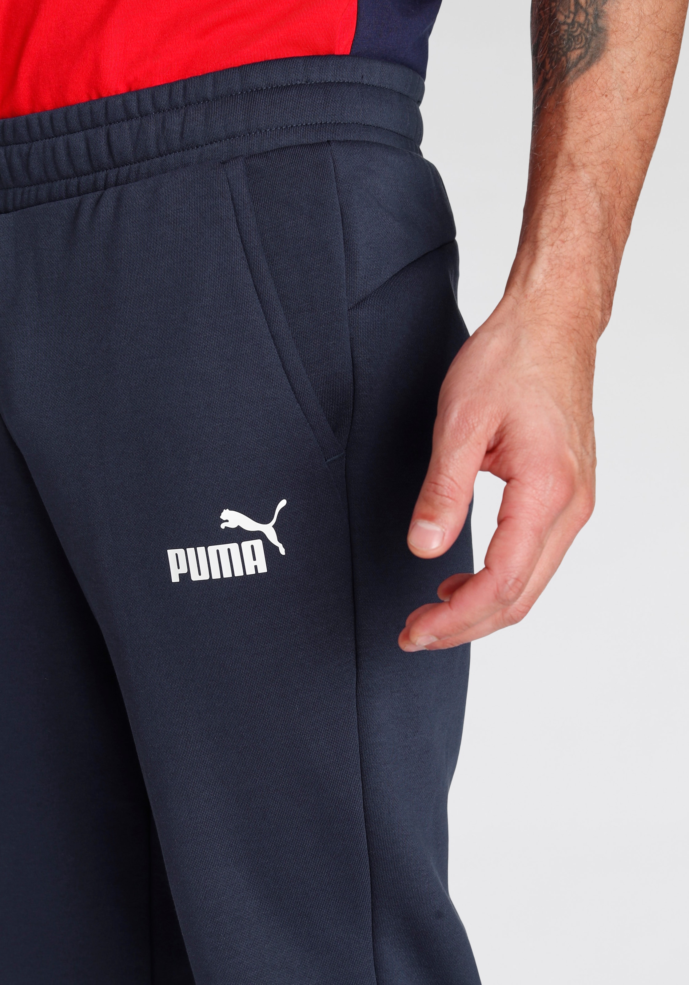PUMA Trainingshose »ESS LOGO PANTS FL CL«