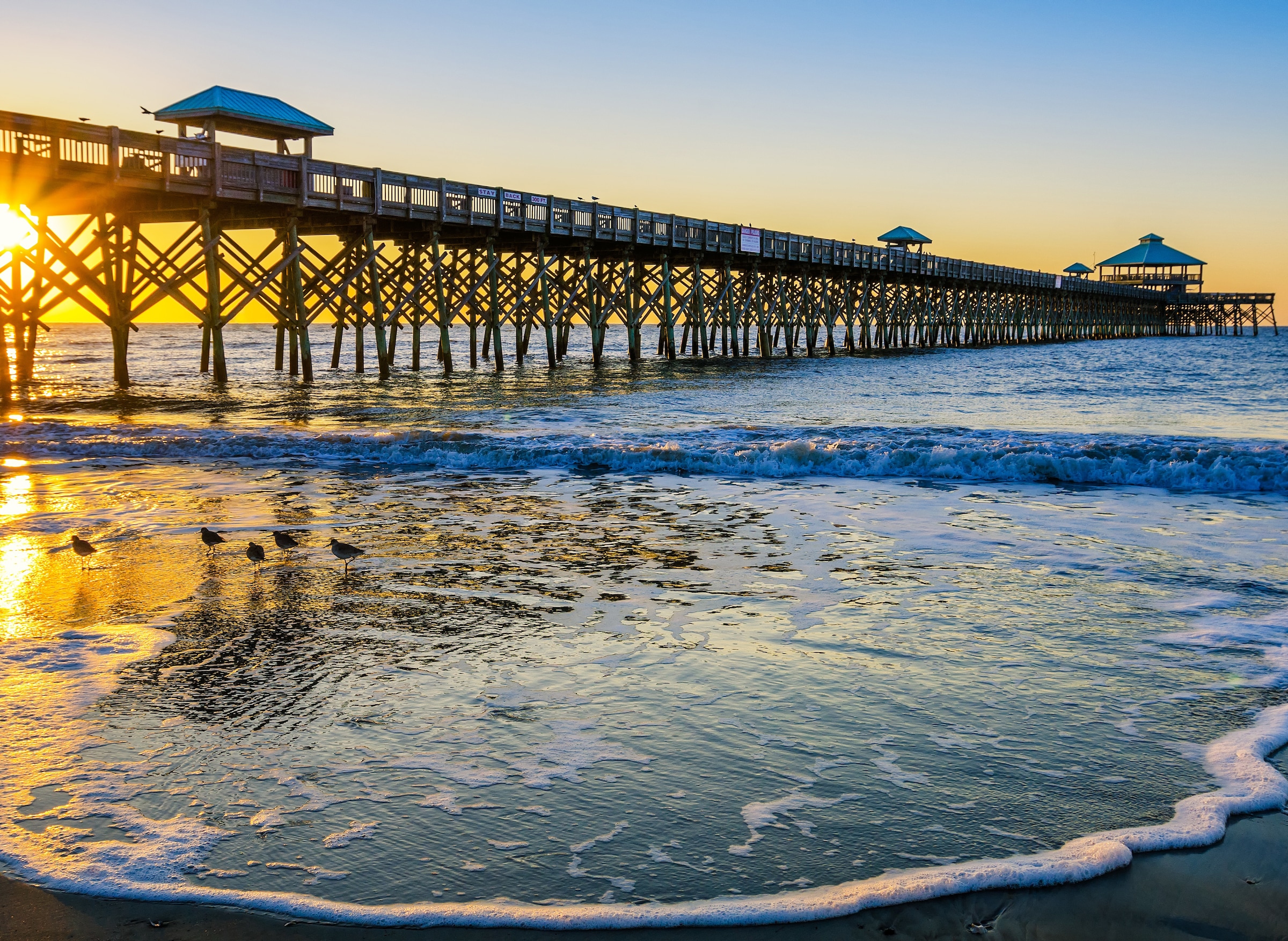 Image of Papermoon Fototapete "Folly Pier Winter Sunrise" glatt