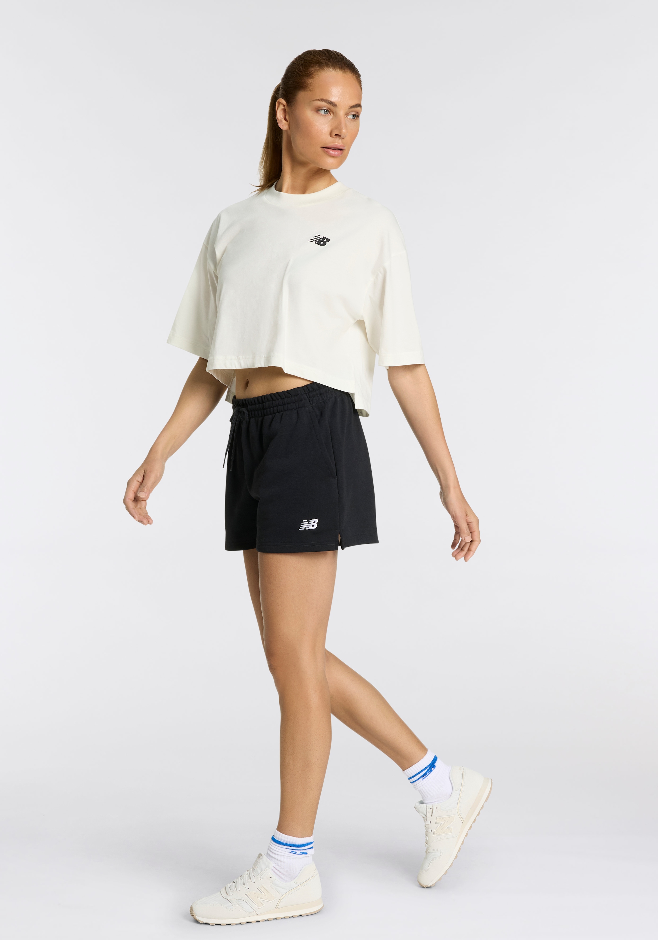 New Balance T-Shirt »Reimagined Oversized Waist T-Shirt«