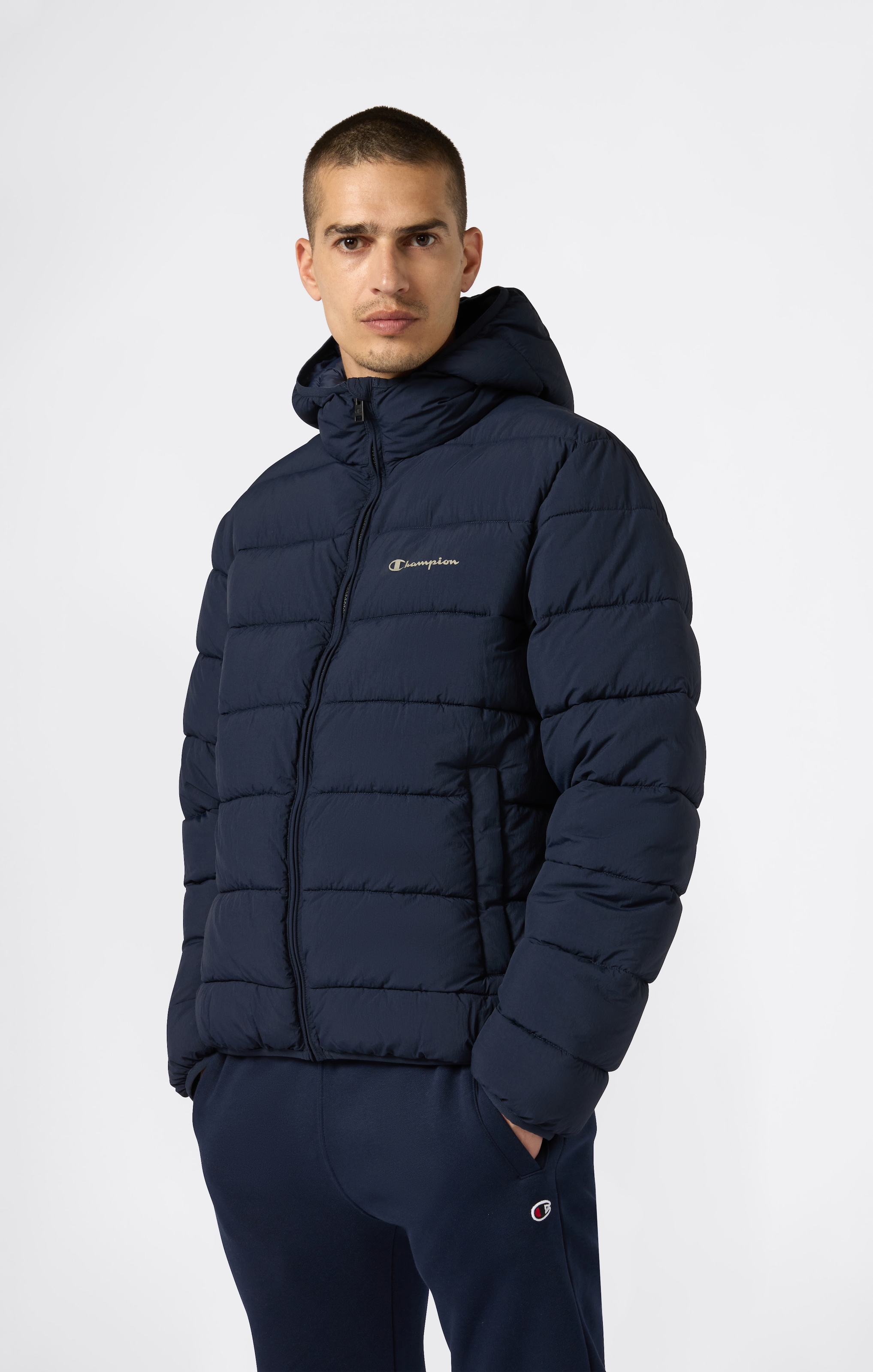 Image of Champion Steppjacke "Padded Outdoor Jacket" mit Kapuze für Erwachsene, aus Polyamid, leichtes Material