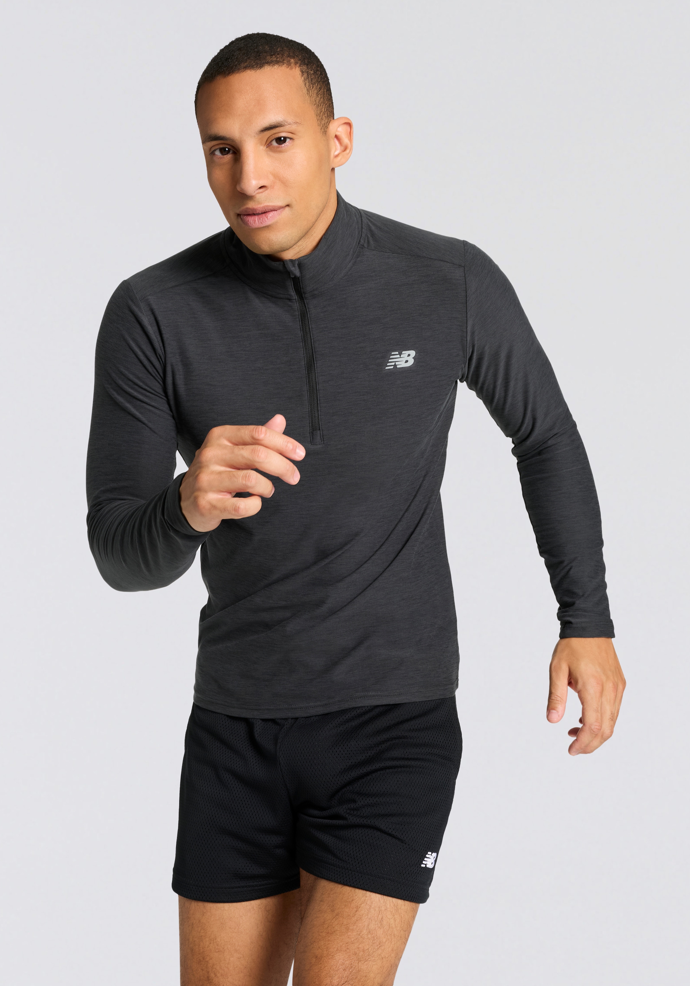 Image of New Balance Laufshirt "Space Dye 1/4 Zip" mit Label