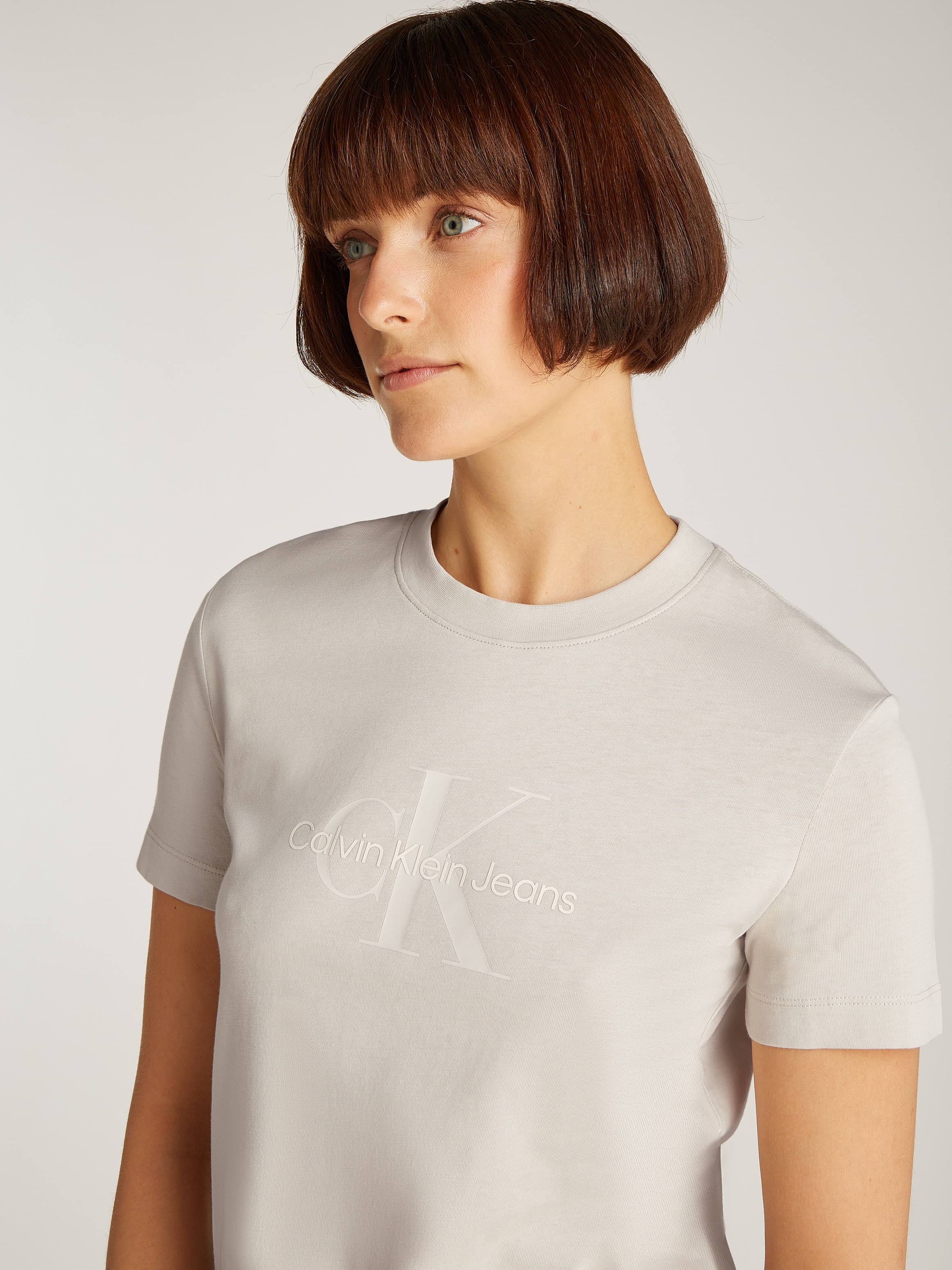 Calvin Klein Jeans Rundhalsshirt »GLOSSY MONOLOGO REGULAR TEE«, mit Logodruck