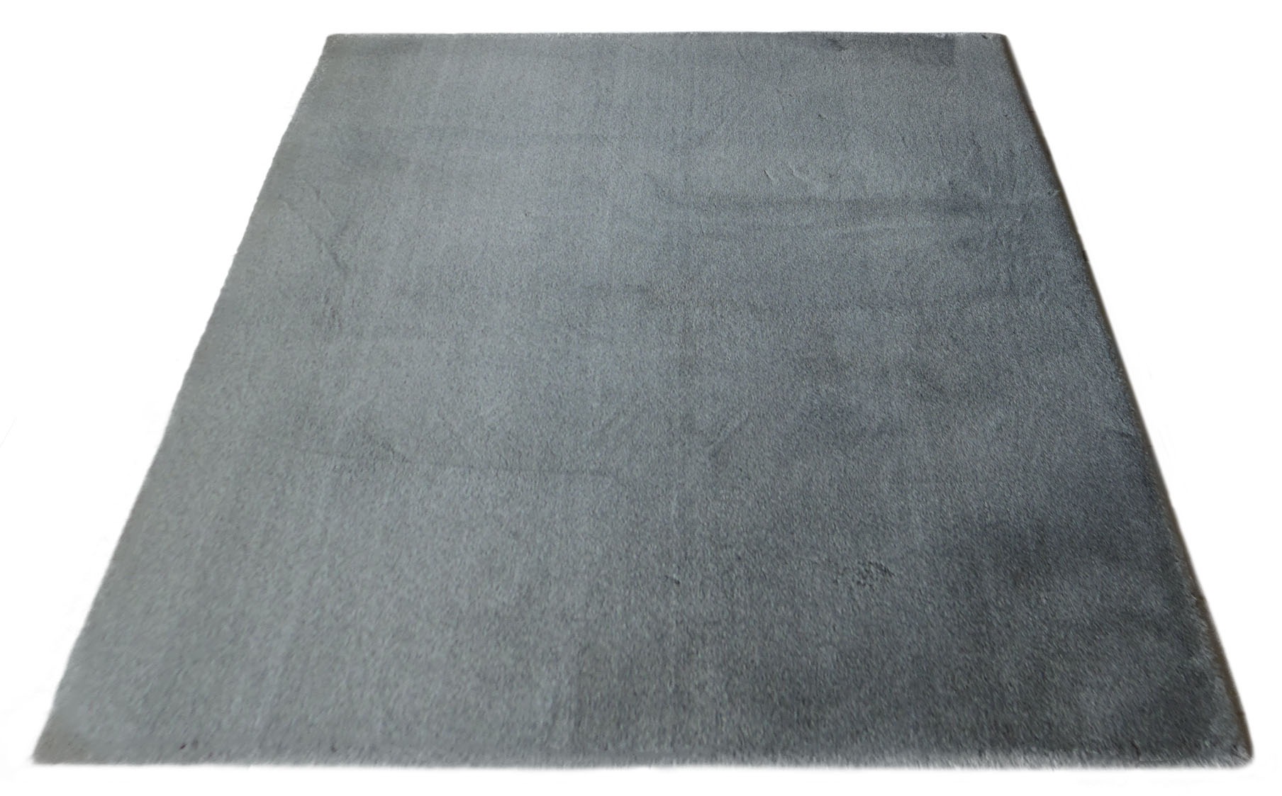 Image of andas Teppich »Felix«, rechteckig, 20 mm Höhe, Teppich, Kaninchenfell Haptik, Meliert, Uni Farben, besonders weich und kuschelig, ideal im Wohnzimmer, Esszimmer & Schlafzimmer bei Ackermann Versand Schweiz