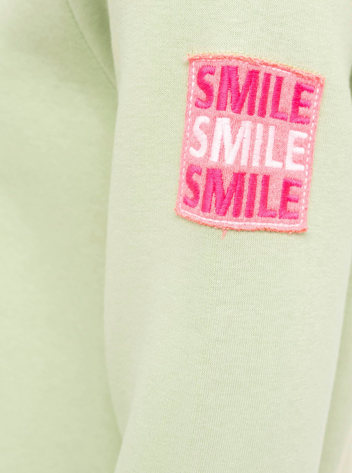 Zwillingsherz Jerseymantel »"Be Positive"«, mit grossem Stickmotiv, Taschen und Reissverschluss