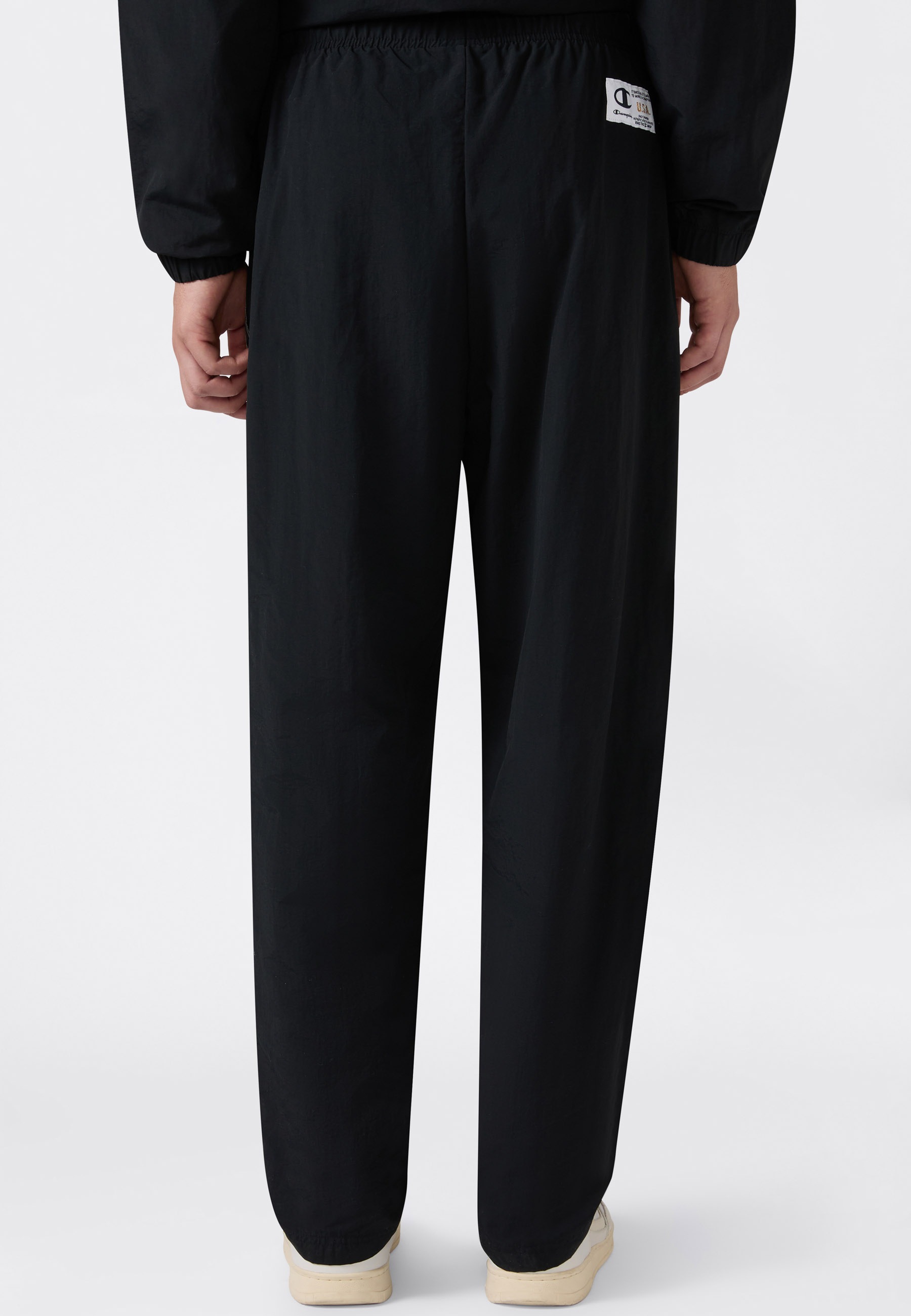Champion Trainingshose »SPORTWEAR OPEN HEM PANTS Loose Fit Nylon«  mit sportlicher Optik, aus Polyamid