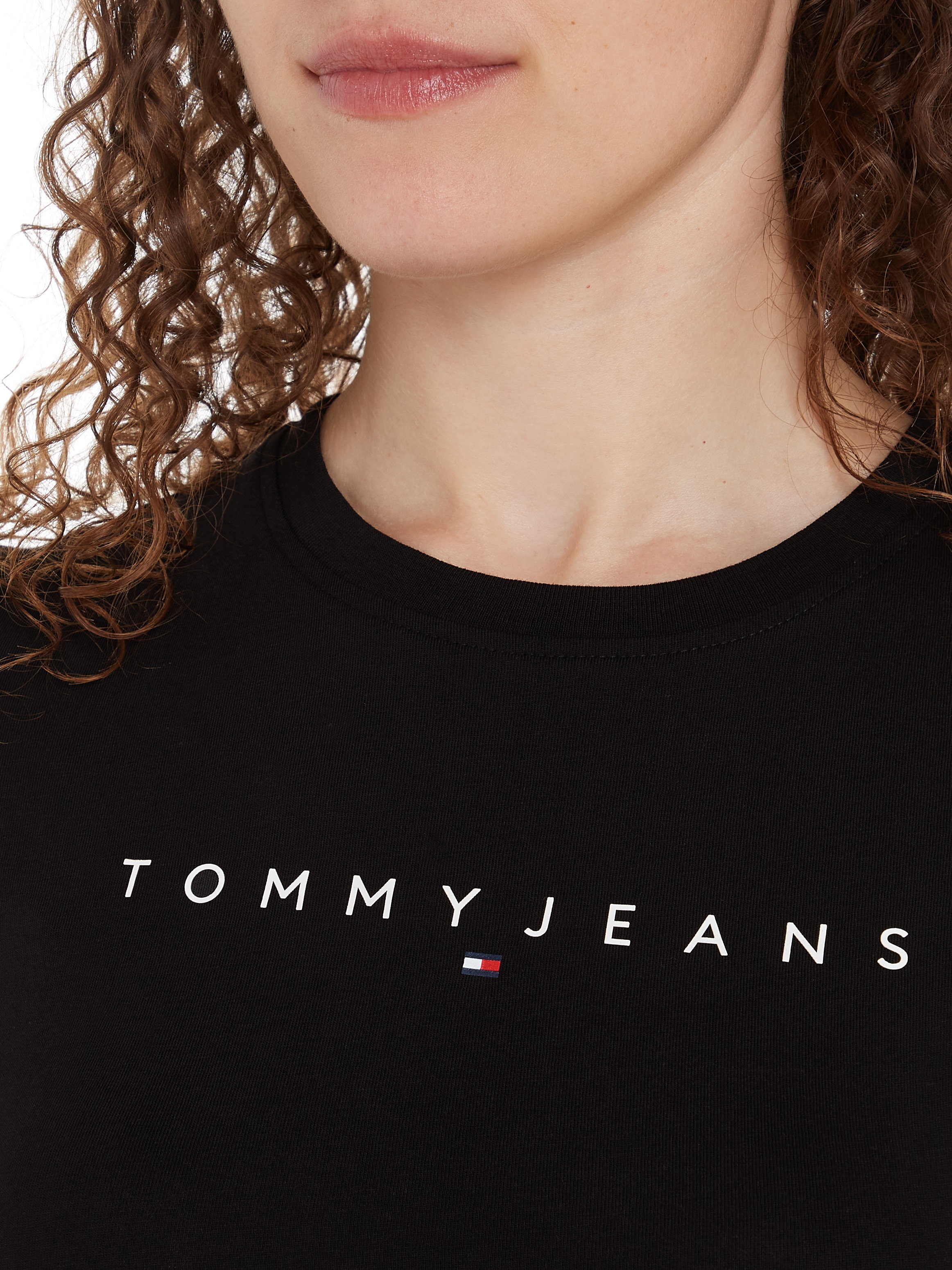 Tommy Jeans Kurzarmshirt »TJW SLIM LINEAR TEE EXT«, mit Tommy Jeans Linear Logo-Schriftzug