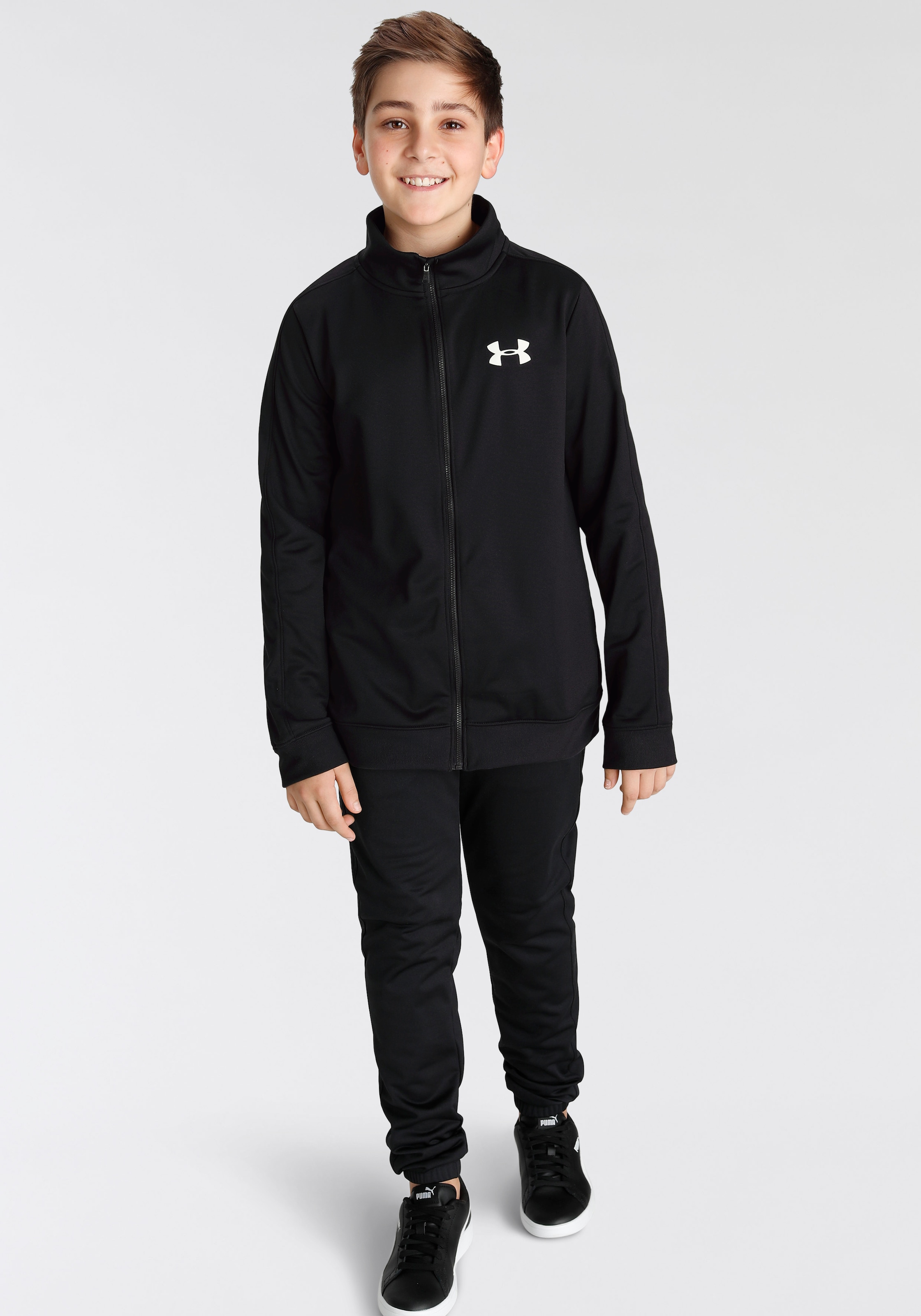 Image of Under Armour Trainingsanzug "UA RIVAL KNIT TRACK SUIT" Für Kinder - Material innen weich angeraut