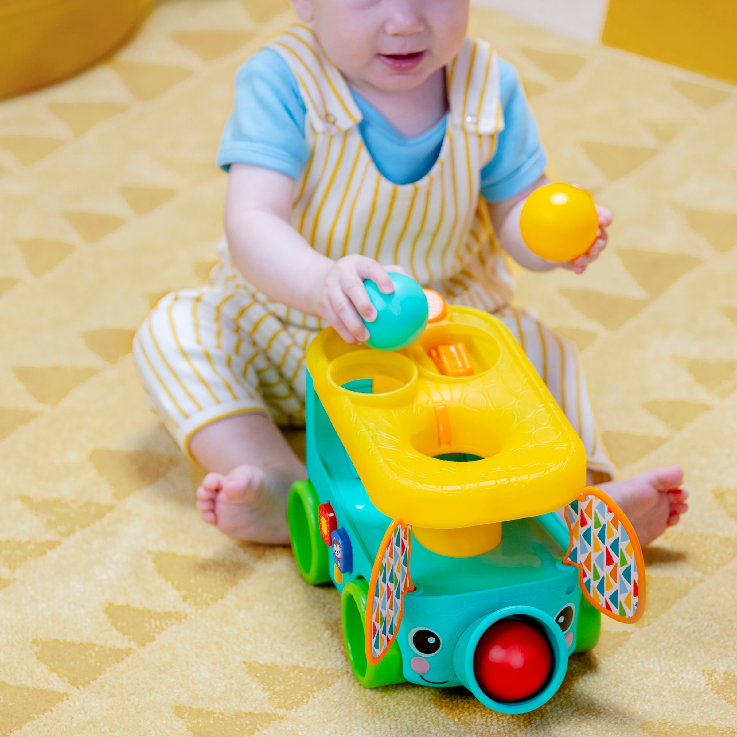 Bright Starts Jouets éducatifs »Pop & Roll Safari Bus  Ball Play Toy« mit Licht und Sound